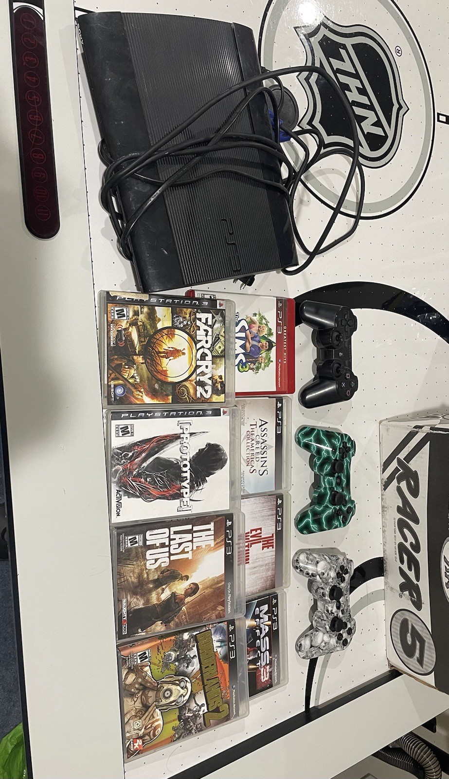 Sony PlayStation 3 Super Slim, Includes 8 Games Lot with Cases & 3 Controllers