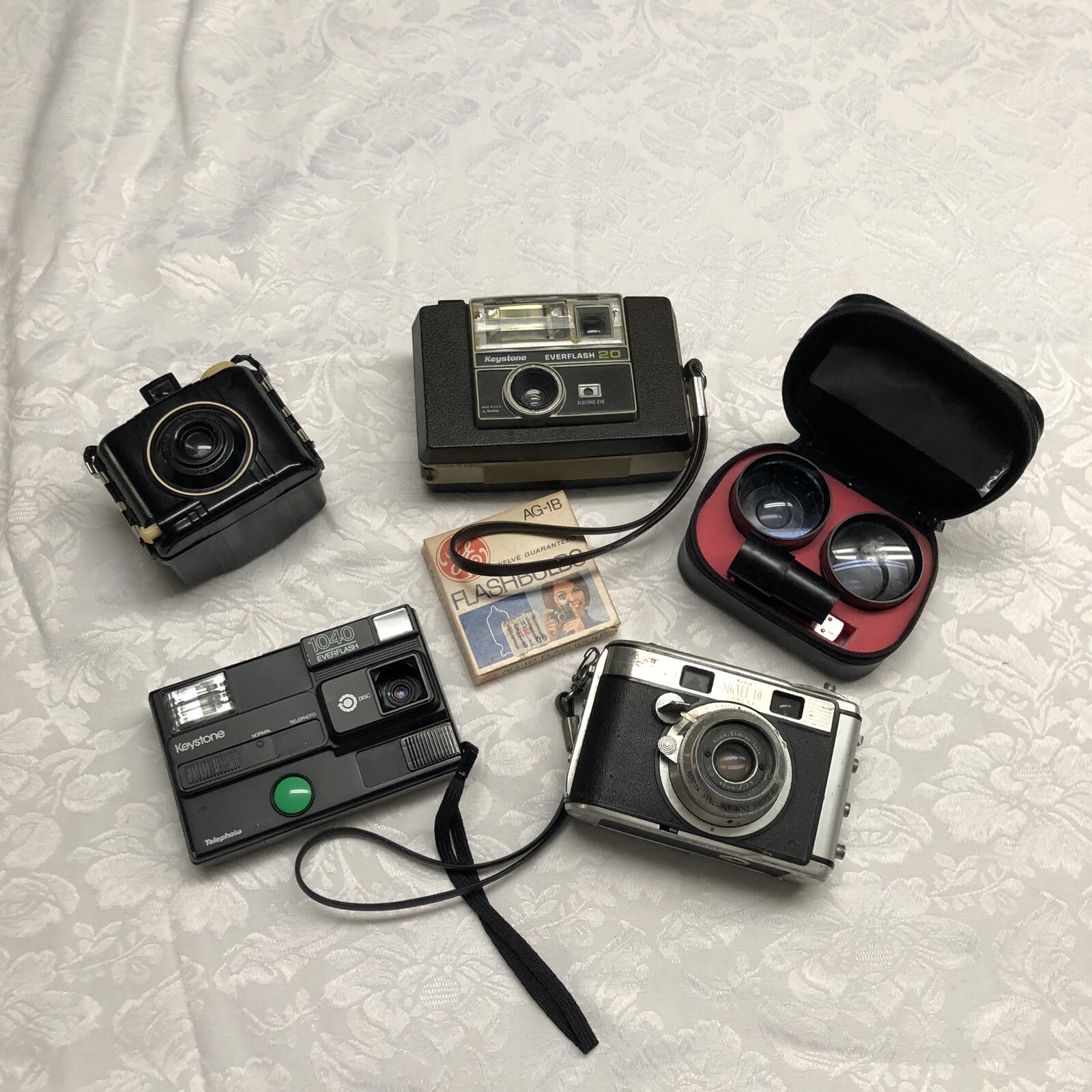 Lot of 4 Assorted Cameras Plus Lenses Flashbulbs Baby Brownie FOR PARTS ONLY @56