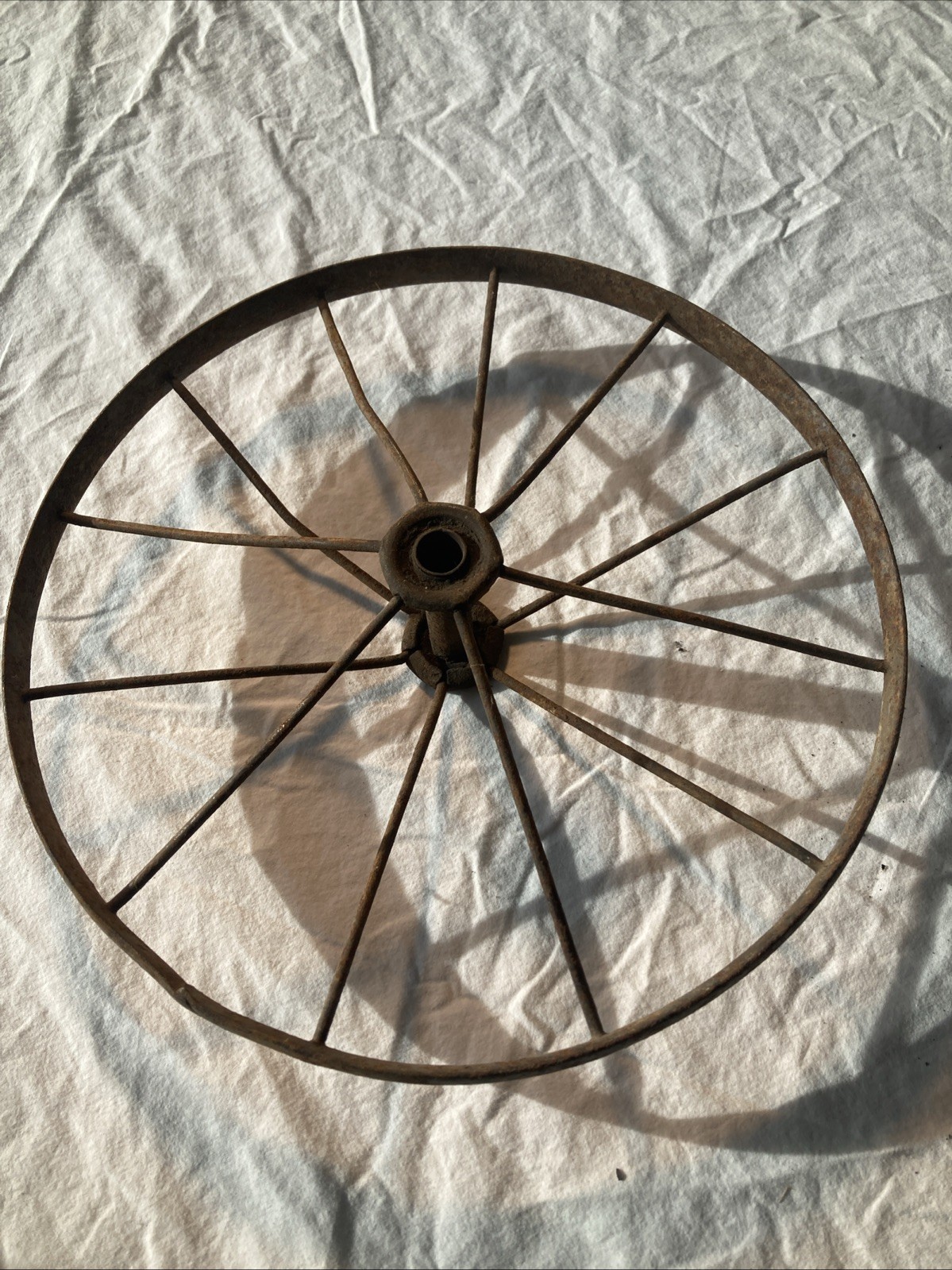 VINTAGE RUSTIC WAGON?, STROLLER?, CART?WHEEL SOLID METAL APPROX 10 3/4" ACROSS 