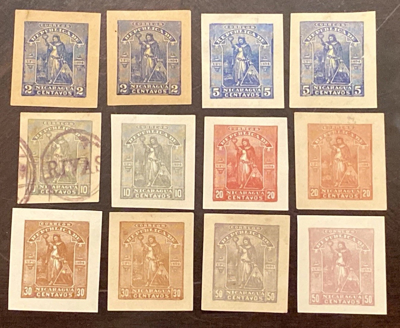 NICARAGUA EARLY POSTAGE STAMP WRAPPERS-CUT CORNERS-CUTOUTS UNUSED & USED (12)