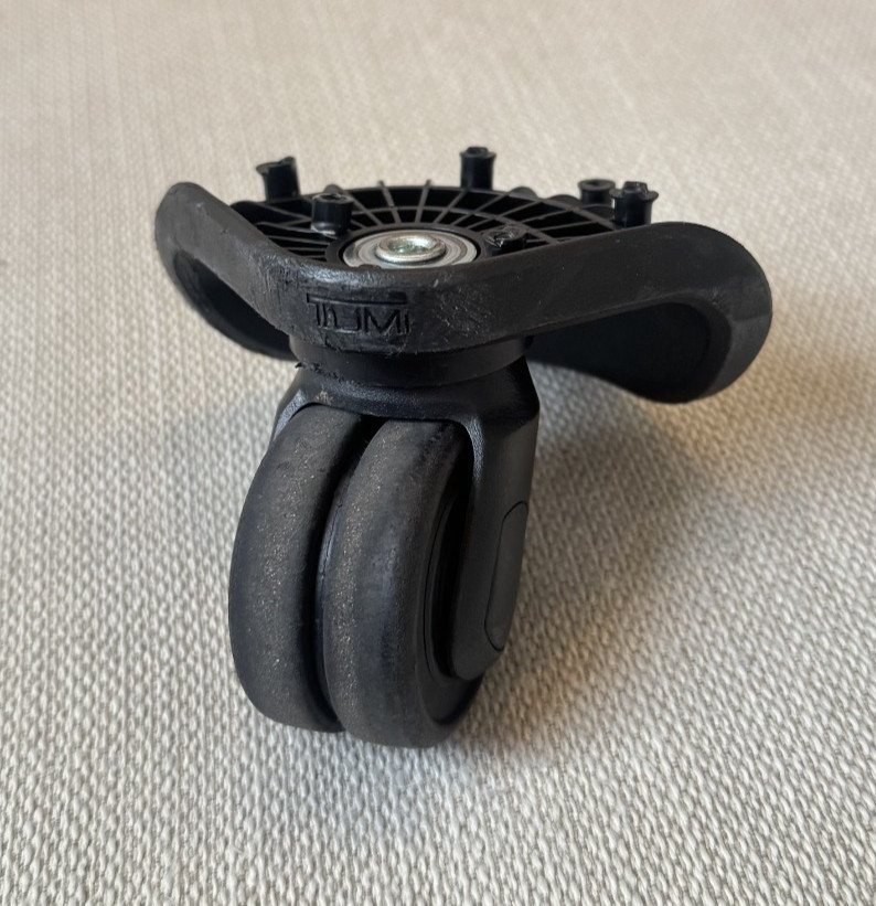 Tumi Merge Spinner Replacement Wheel, UNIVERSAL 95142-01A - Good Condition