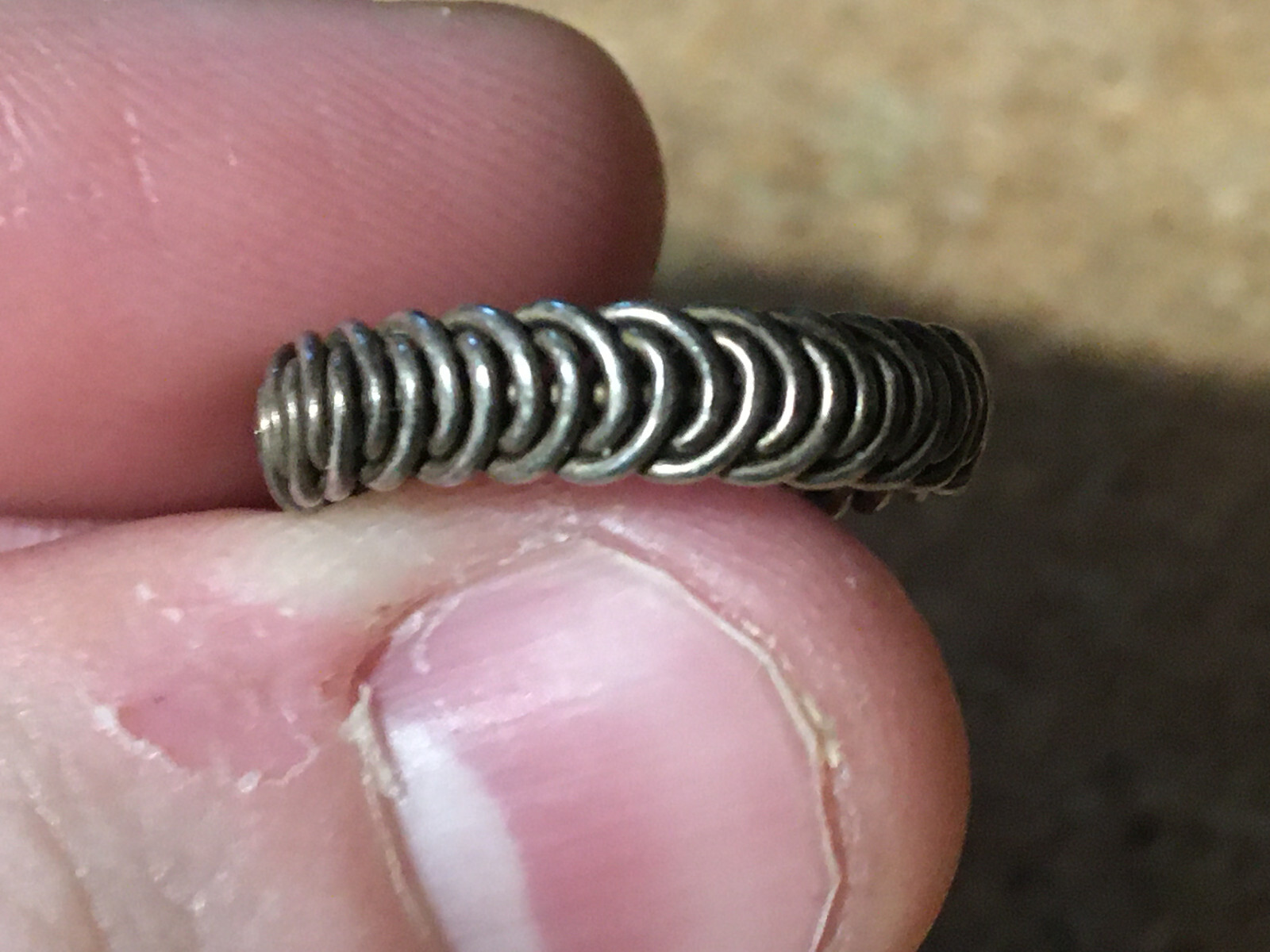 SILVER WIRE COIL RING SIZE 6 / WRONGWAY052