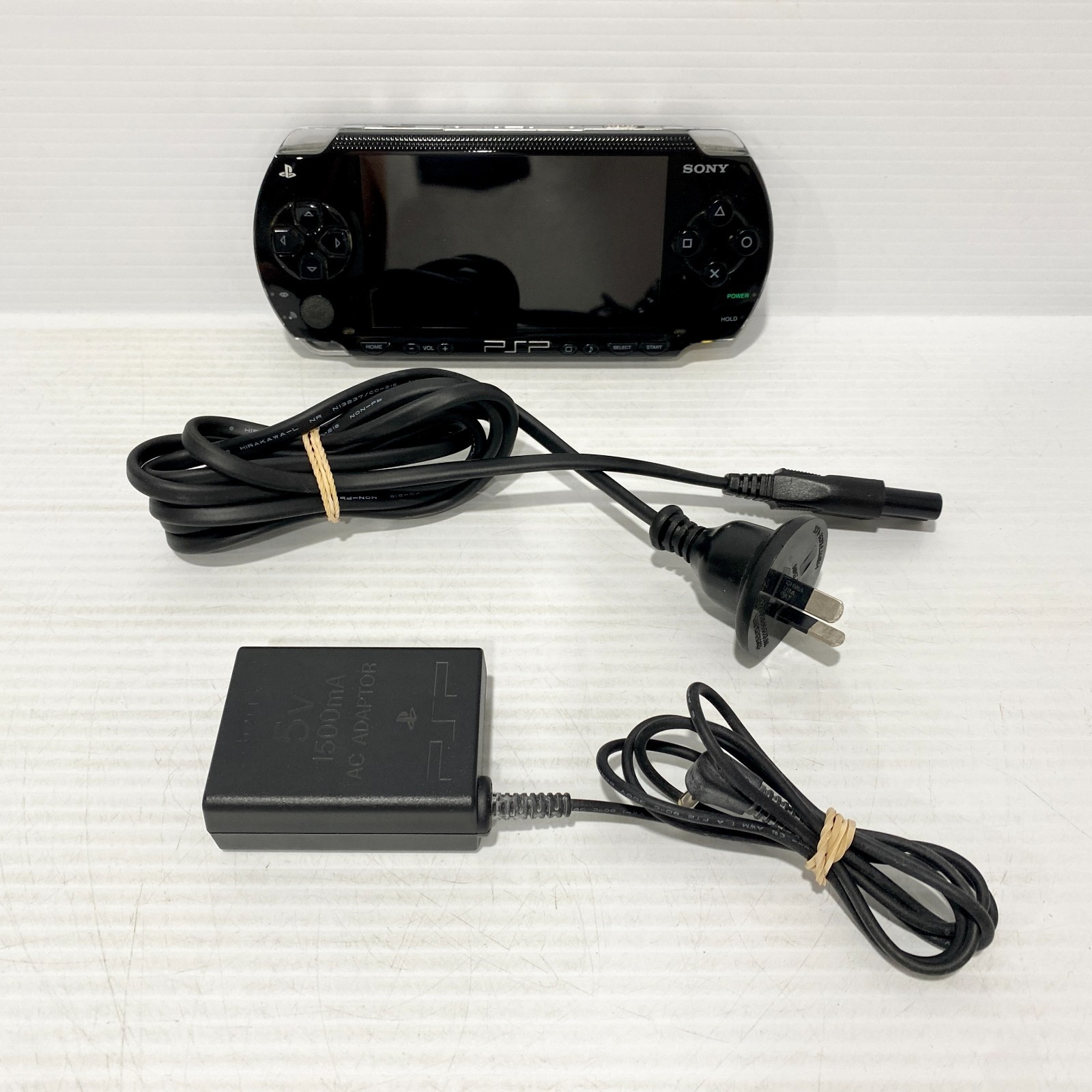 Sony PSP-1002 Handheld Console + Charger - Tested & Working - Free Postage