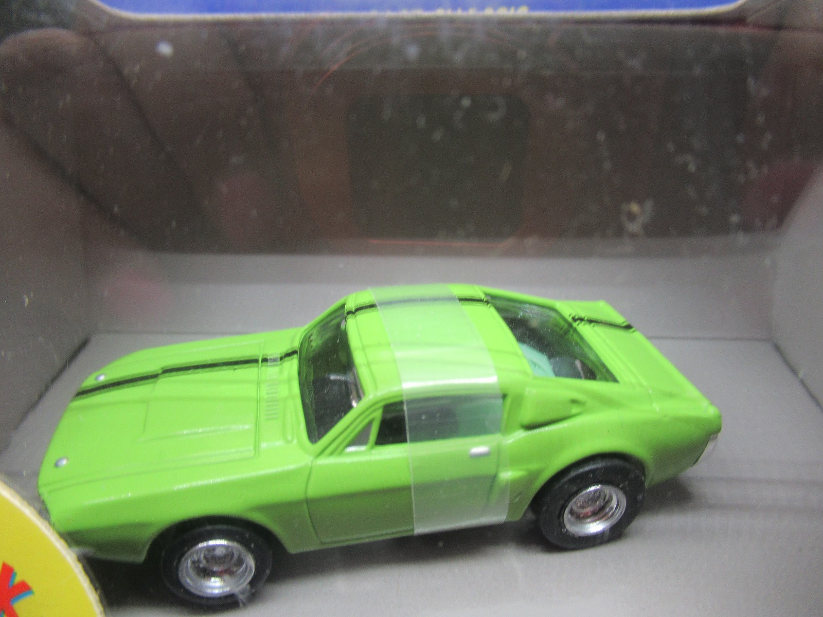 "NEW" JOHNNY LIGHTNING AFX LIME GREEN SHELBY (PULL BACK)