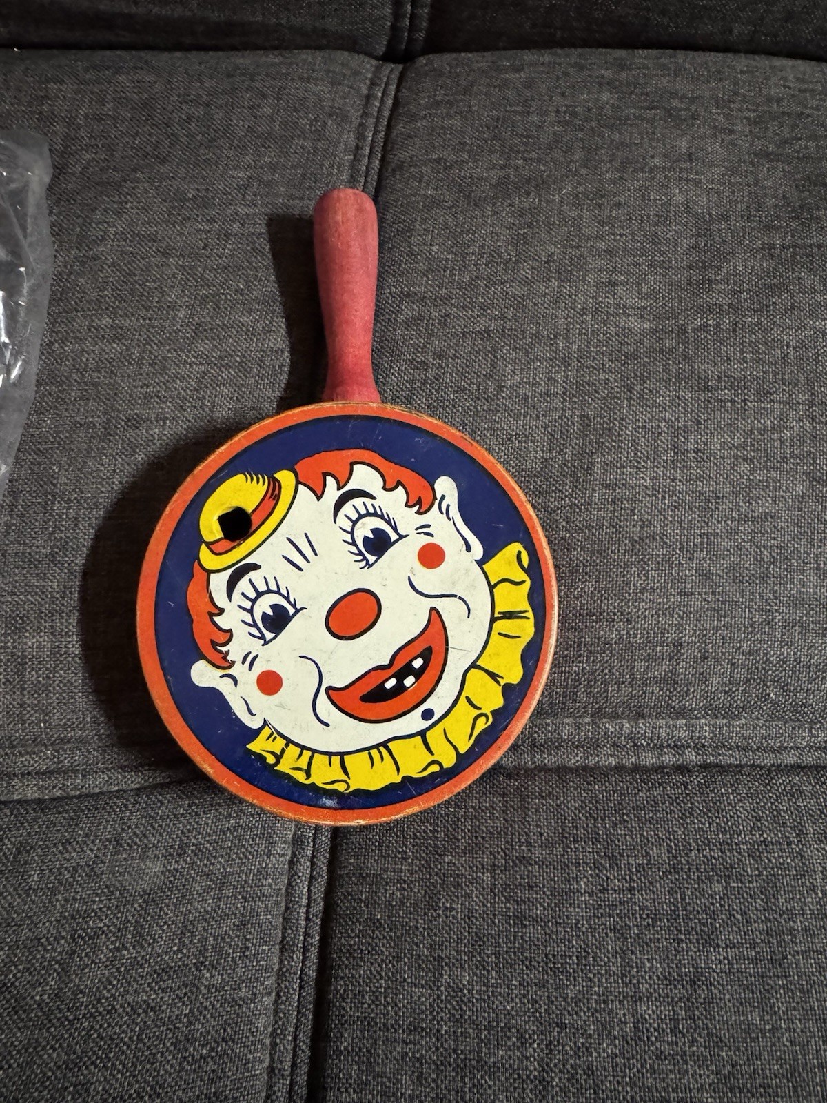 Vintage KIRCHHOF Tin Noisemaker Clown face, Red Wood Handle 1950’s