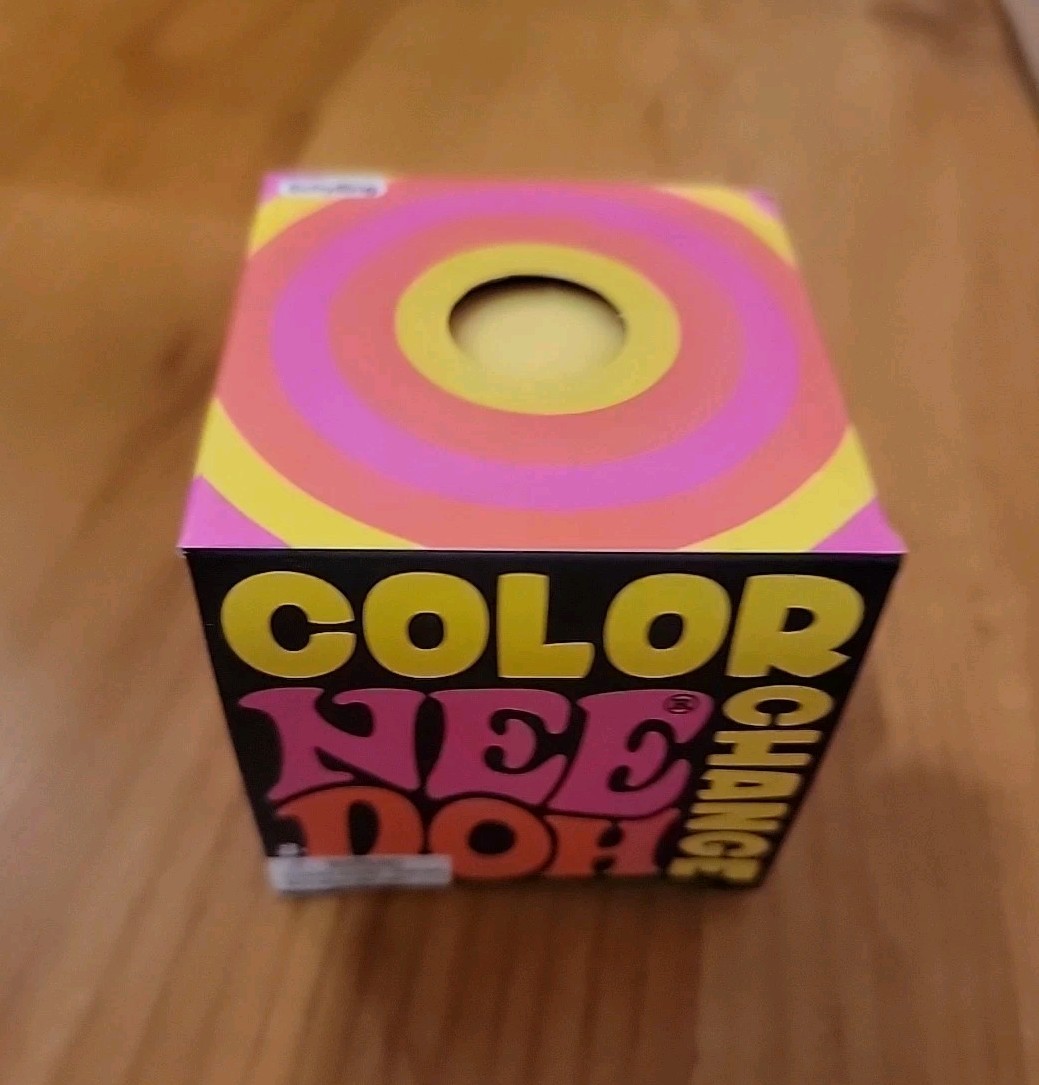 Brand New Sealed Nee Doh Yellow Color Changing Squeeze Ball