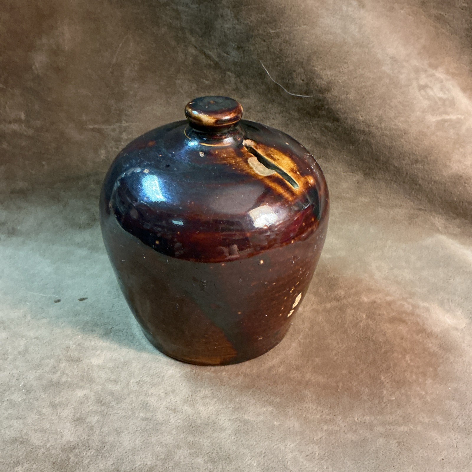 Mid 19th century hand thrown beehive shape coin bank stoneware brown glaze