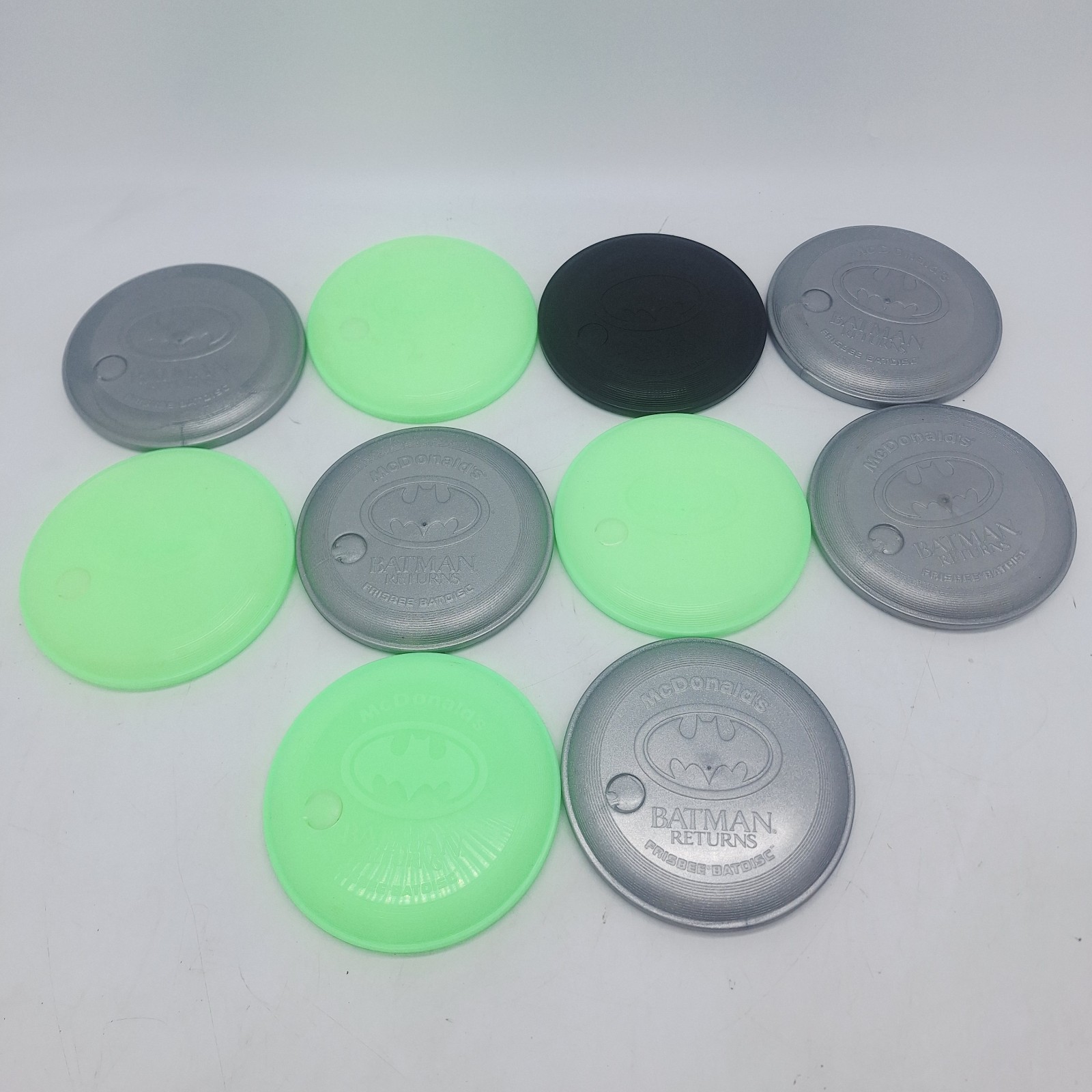 Lot of 10 1991 McDonald's Batman Returns 4” Frisbee Cup Lid Silver Black & Green