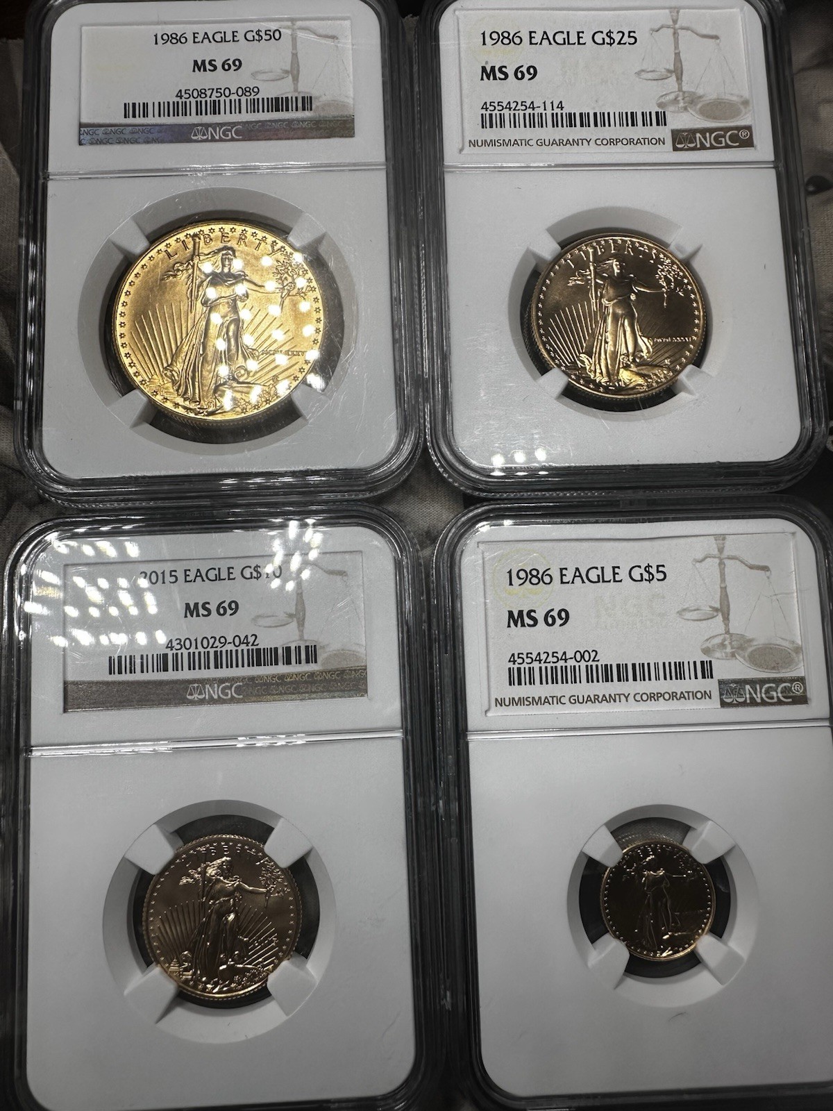 1986 Gold American Eagle 4 Coin Mint State Set NGC MS69 - 1.85 oz AGW