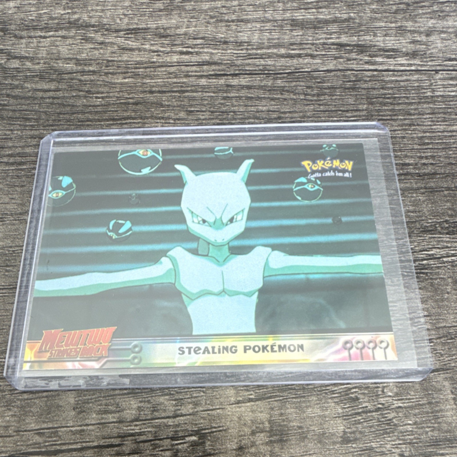 Topps 1999 Pokémon Mewtwo Strikes Back Stealing Pokémon Card #27 Vintage