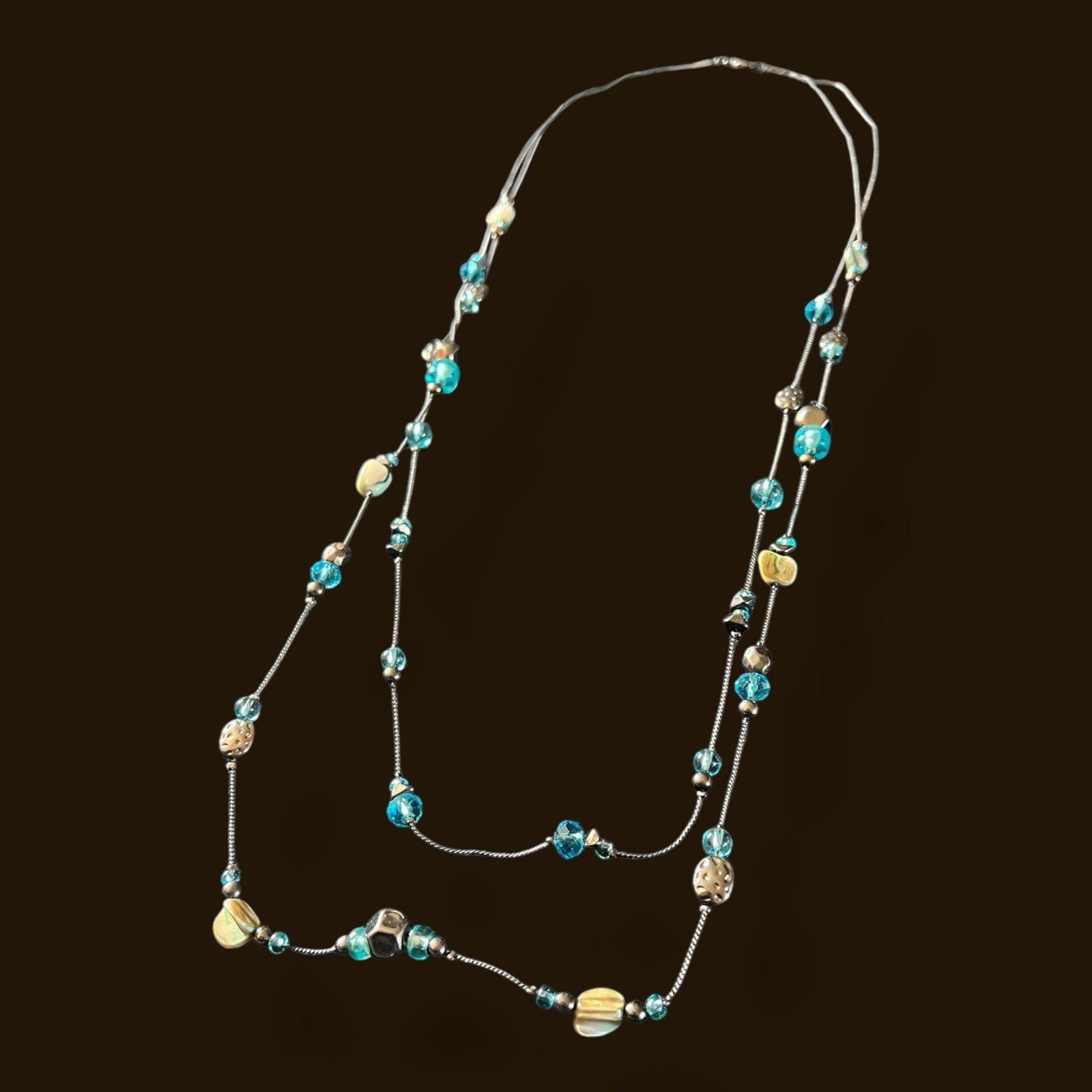 Vintage Station layered necklace features clear blue beads. CJ32