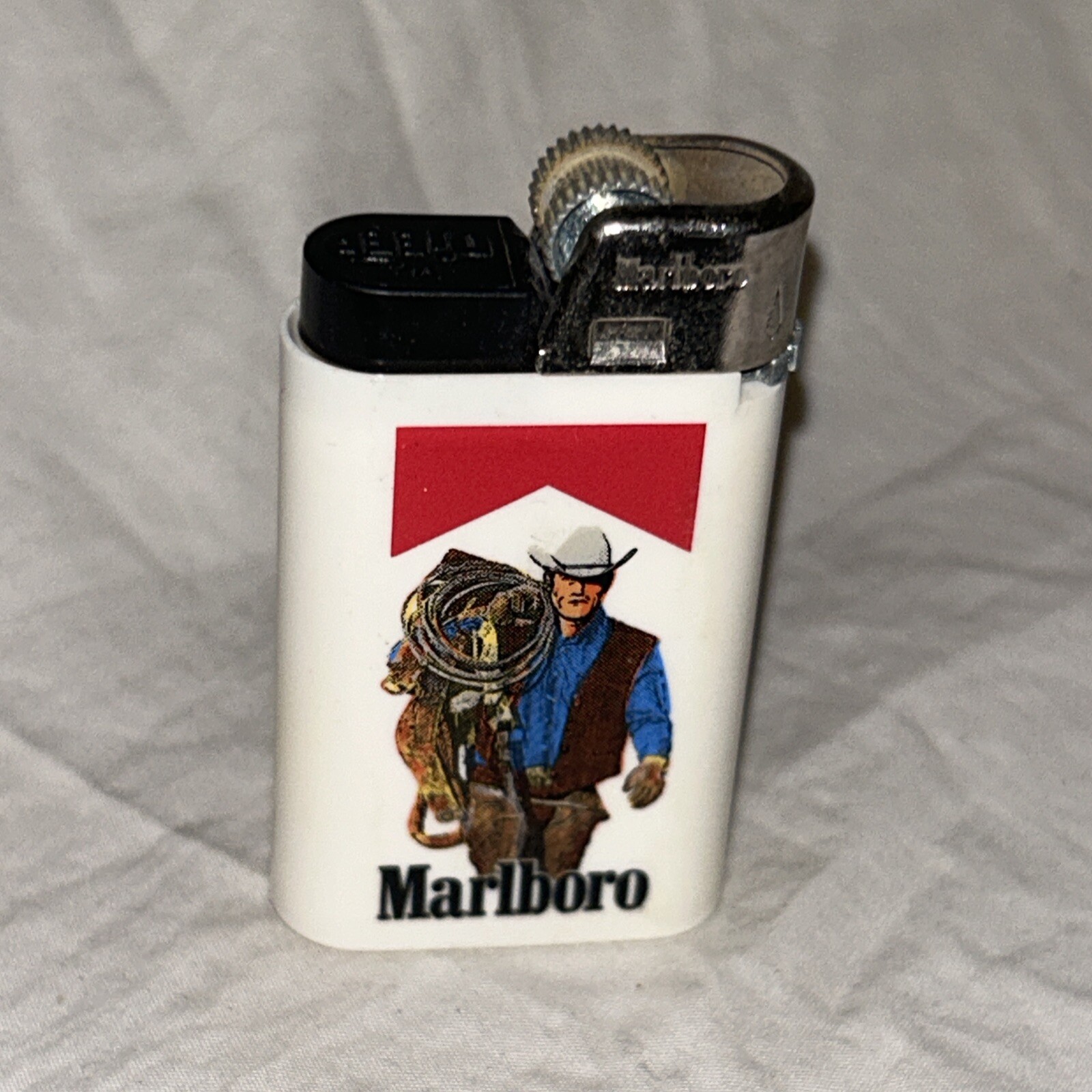 Marlboro Cigarettes Marlboro Man Disposable Lighter Cowboy Carrying A Saddle A2