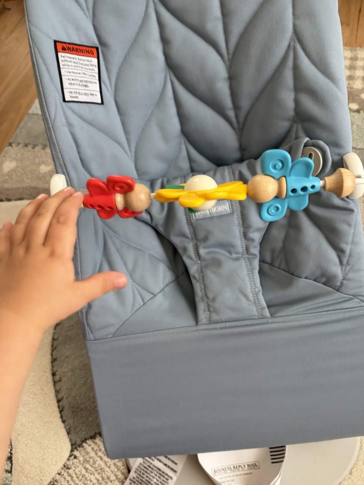 BabyBjörn Blue Foldable Portable Baby Bouncer with Toy Bar for Infant Toddler