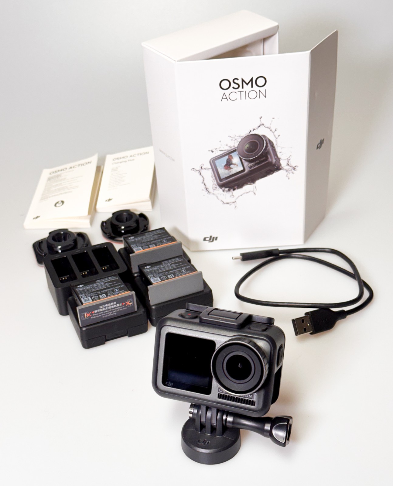 DJI Osmo Action 1 Camera w/3 orig batteries charge dock, cage, mounts GREAT COND