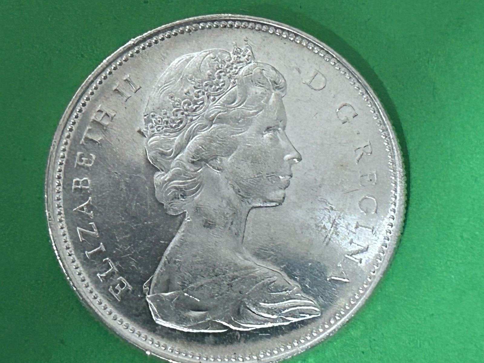1965 Canada Dollar , 80% Silver ,ASW IS .60 Of An Ounce , Nice Details