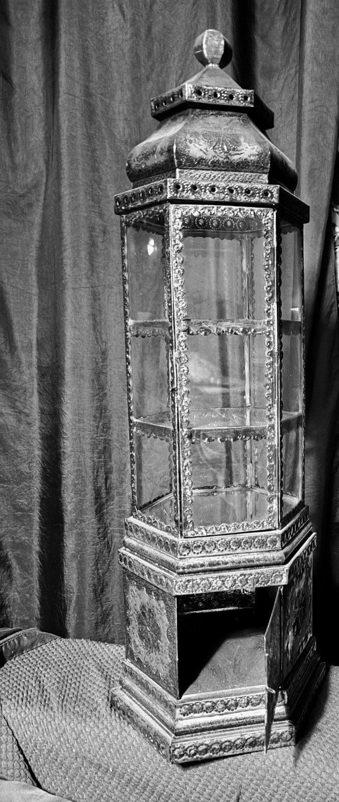 ornate glass and metal display case