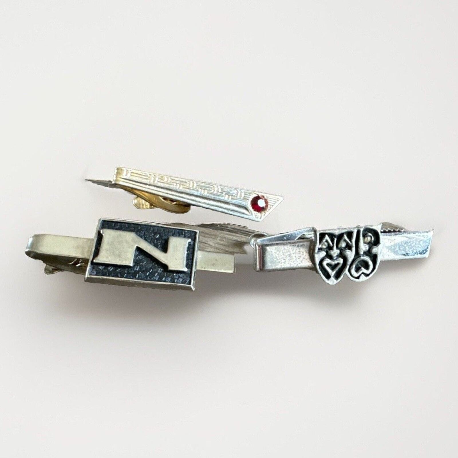 Vintage MCM Tie Bar Clips Silver Tone 1 Swank “N”. Faux Ruby, & Theater Masks