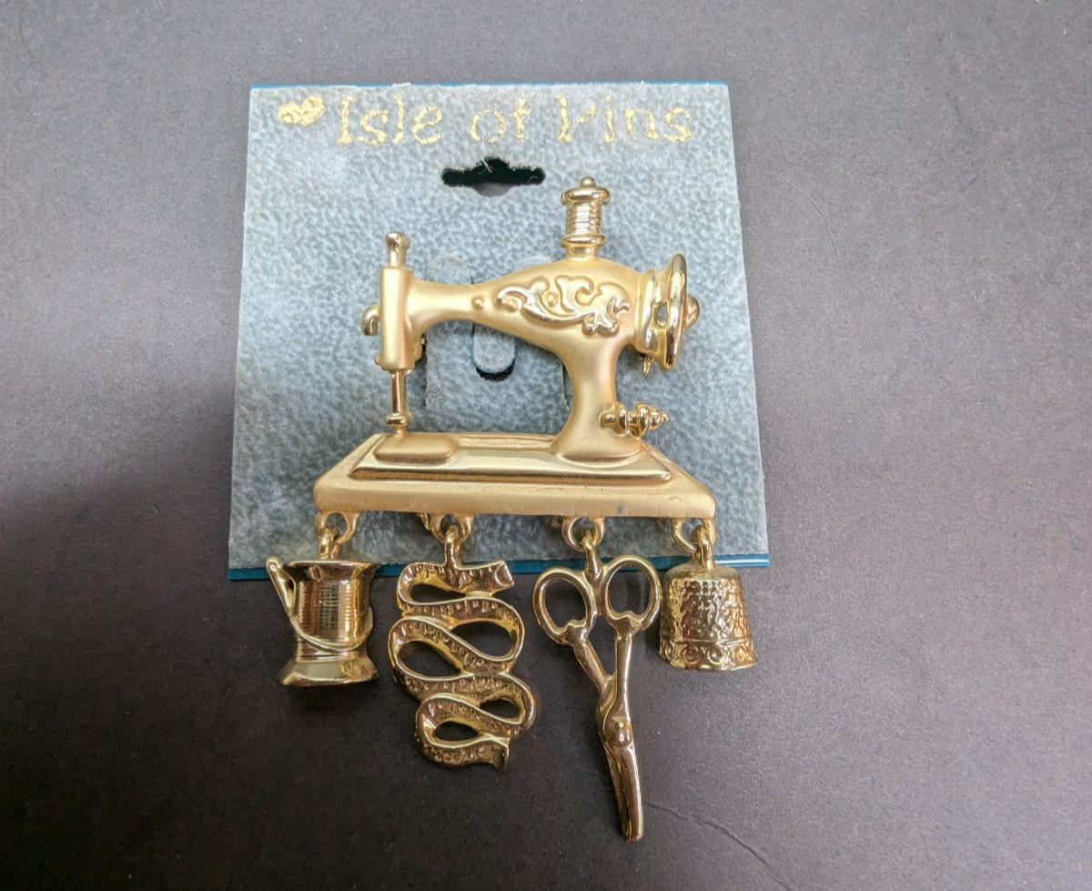 Vintage Isle of Pins Gold Tone Sewing Machine with Charms Brooch Pin