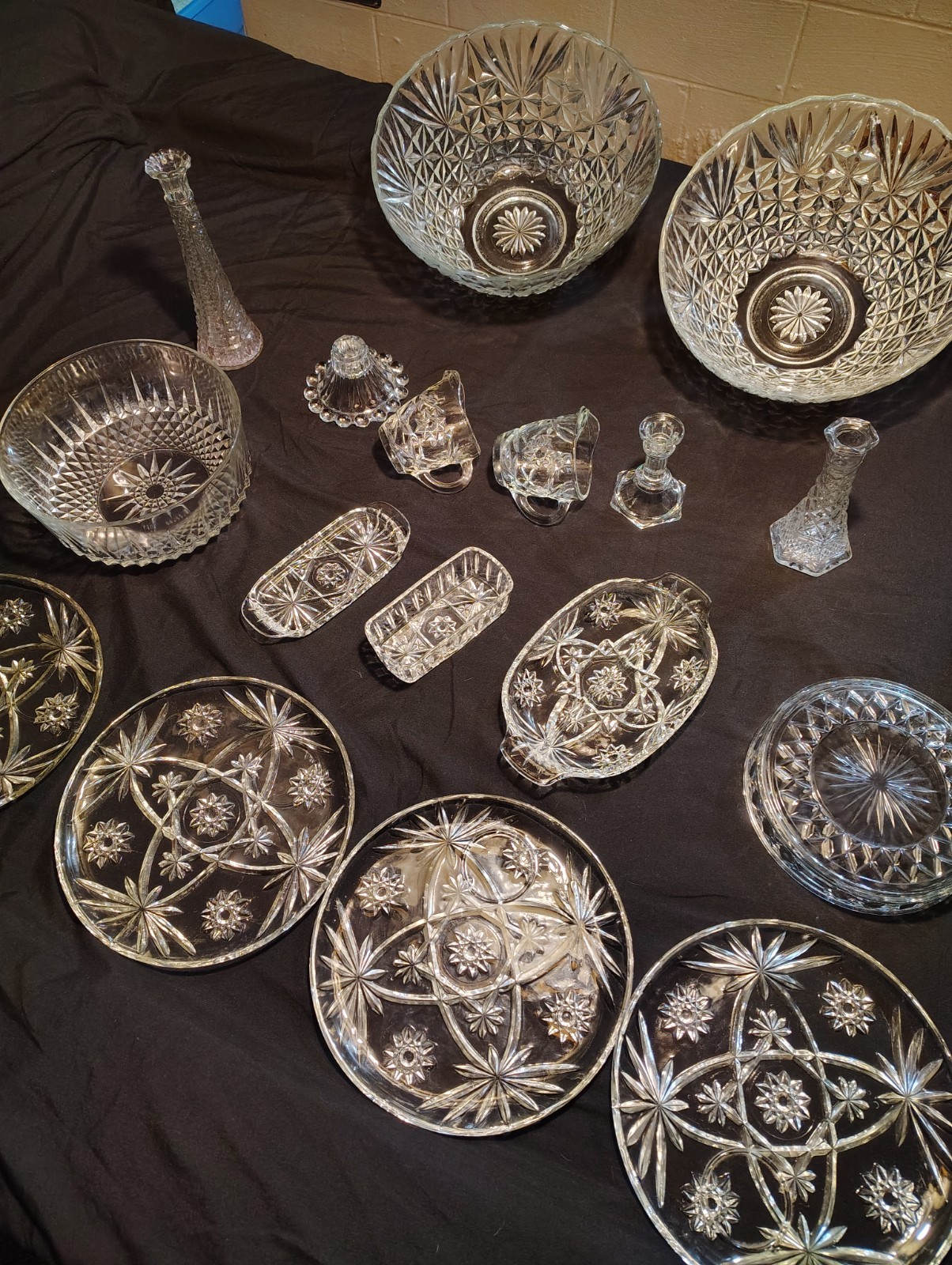 A vintage Anchor Hocking crystal diningware. -Pumchbowls,Plates,vases,etc.(16pc)