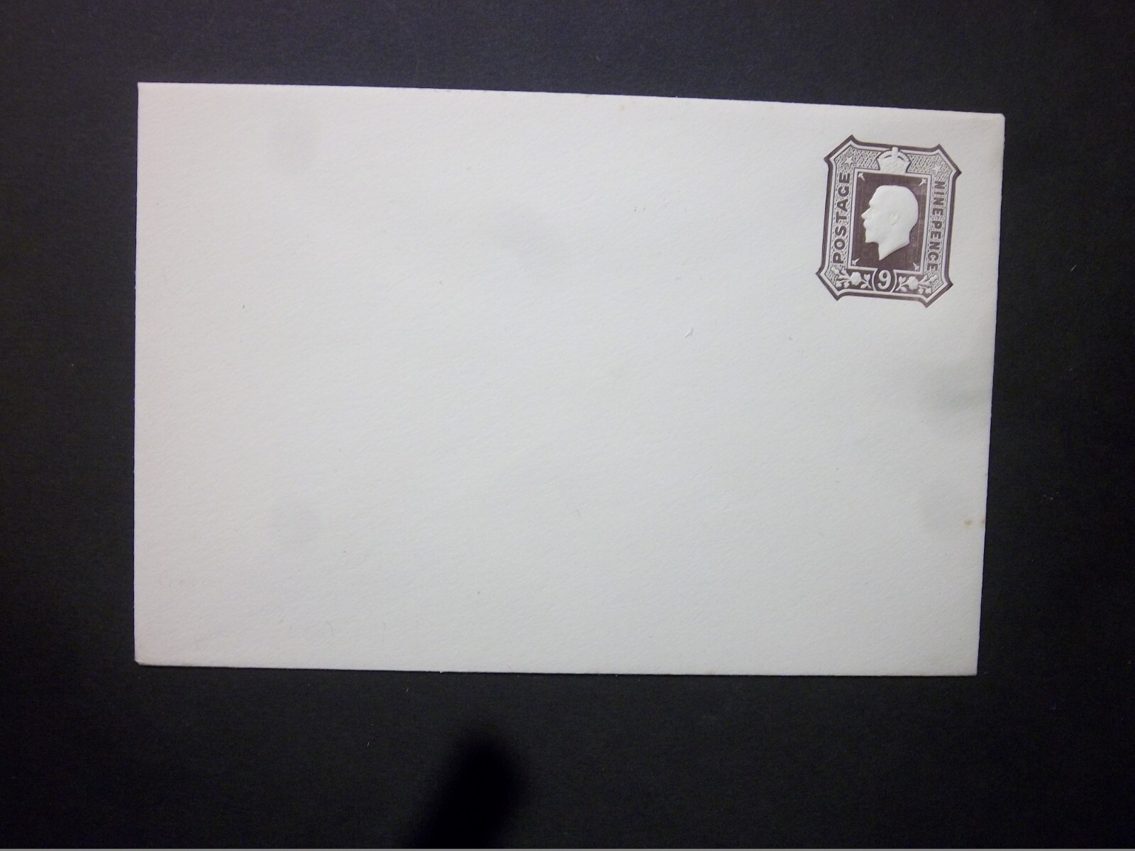 GB Postal Stationery STO KGV 9d dark brown embossed Envelope unused H&B ES50