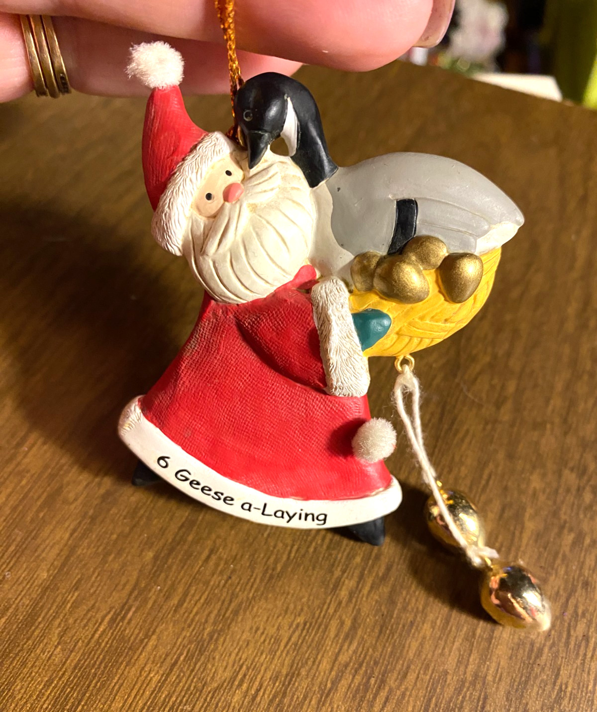 Resin Santa Holding 6 Geese a-Laying 12 Days of Christmas Ornament 3"