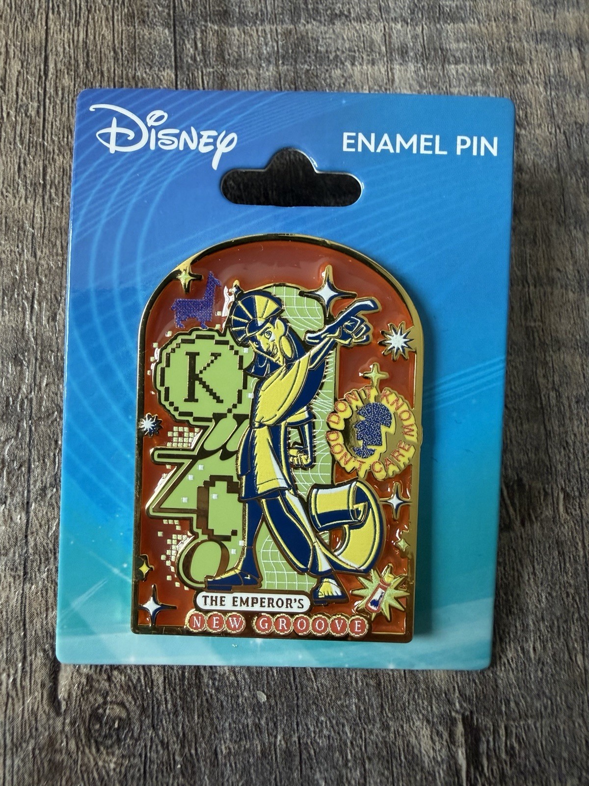 Disney BoxLunch Emperor’s New Groove Monogram Kuzco Don't Know Don't Care Pin