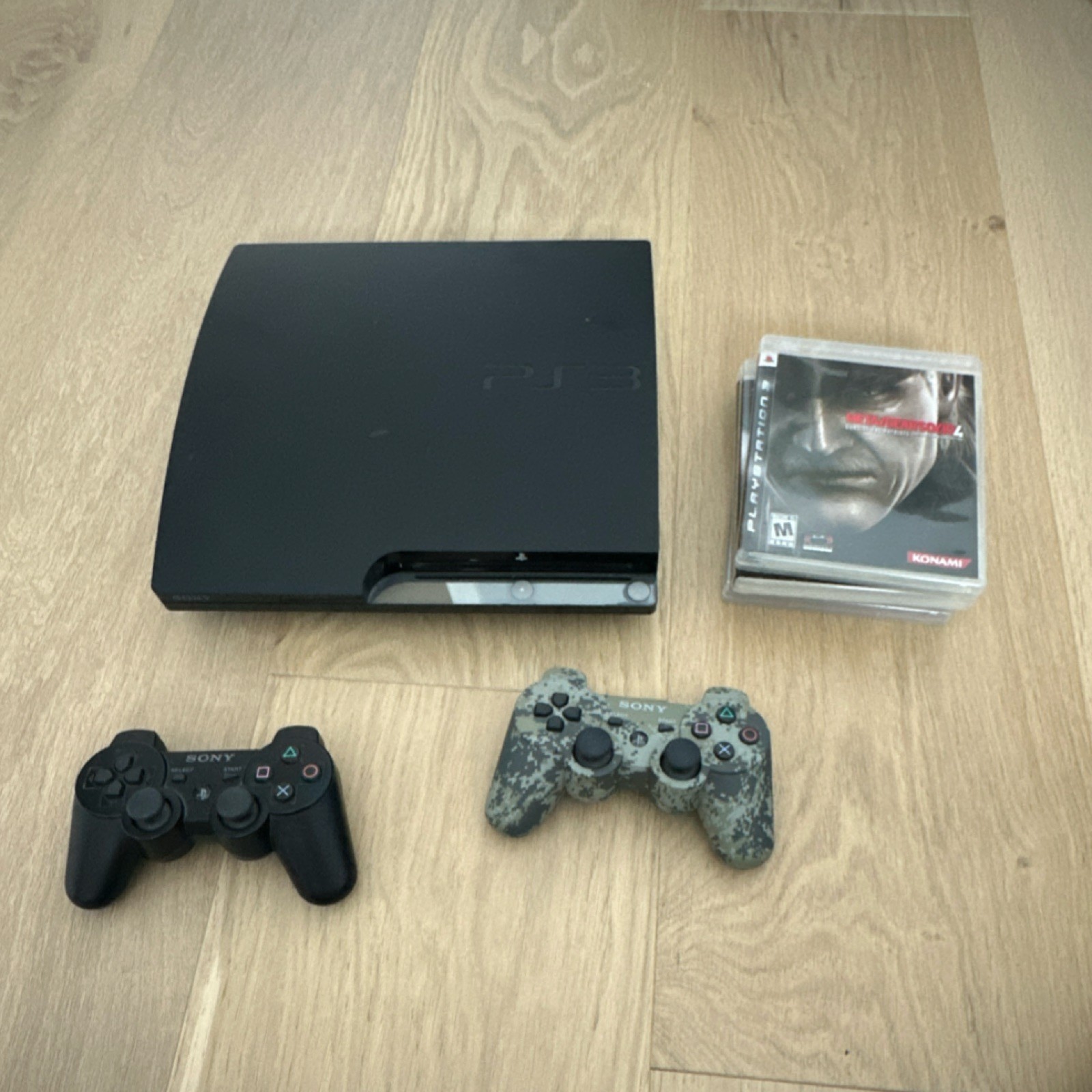 Sony PlayStation 3 slim 160gb Console w/ 2 Wireless Controllers 4 games! TESTED