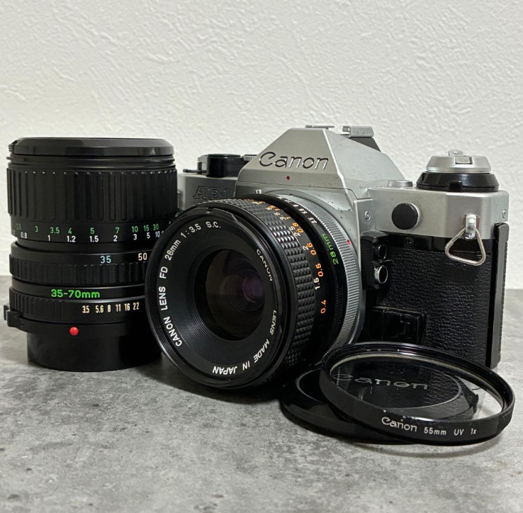Canon AE-1 PROGRAM with replaced mirror + two lenses