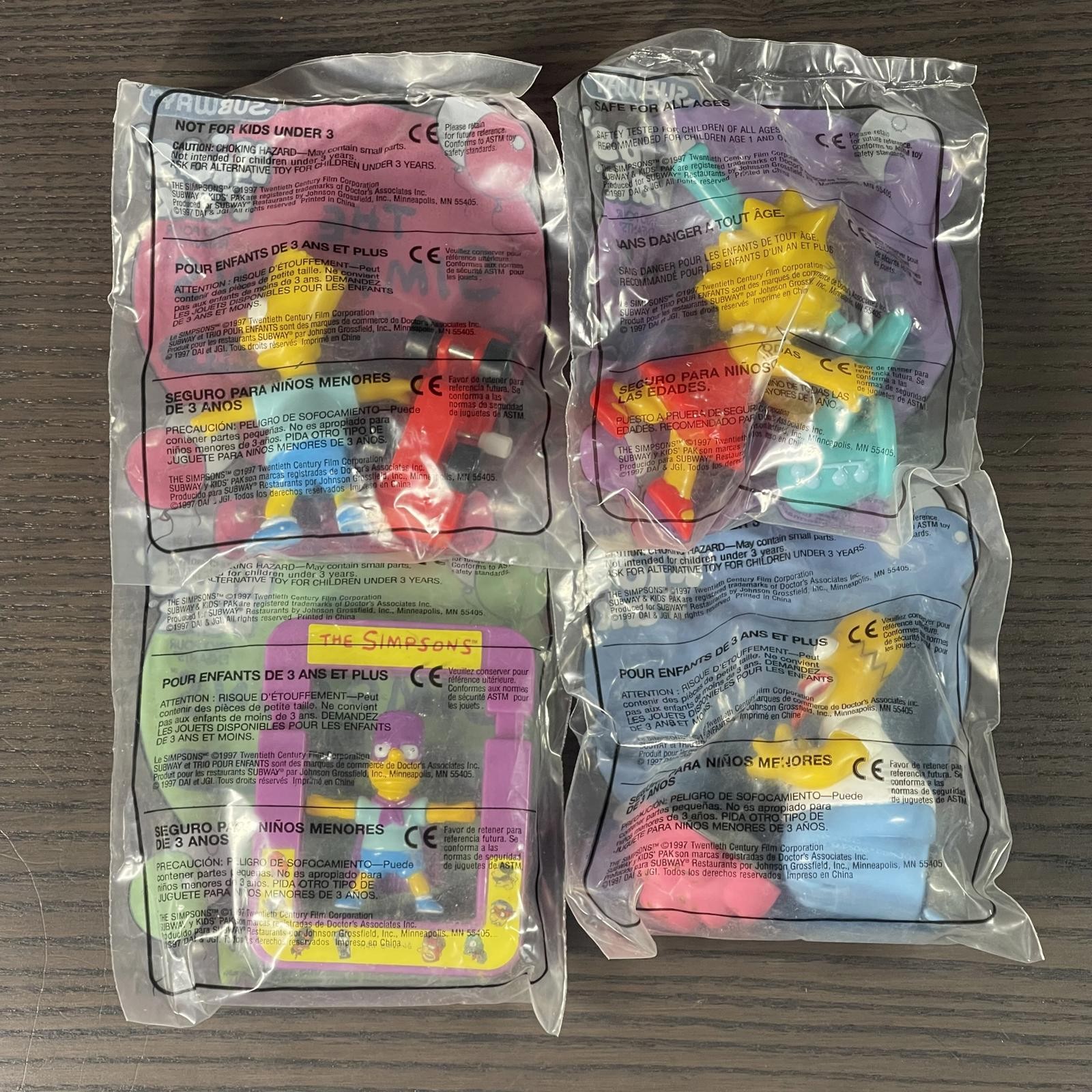 Complete Set of 4 Subway The Simpsons sealed new in pack Bart Lisa Homer
