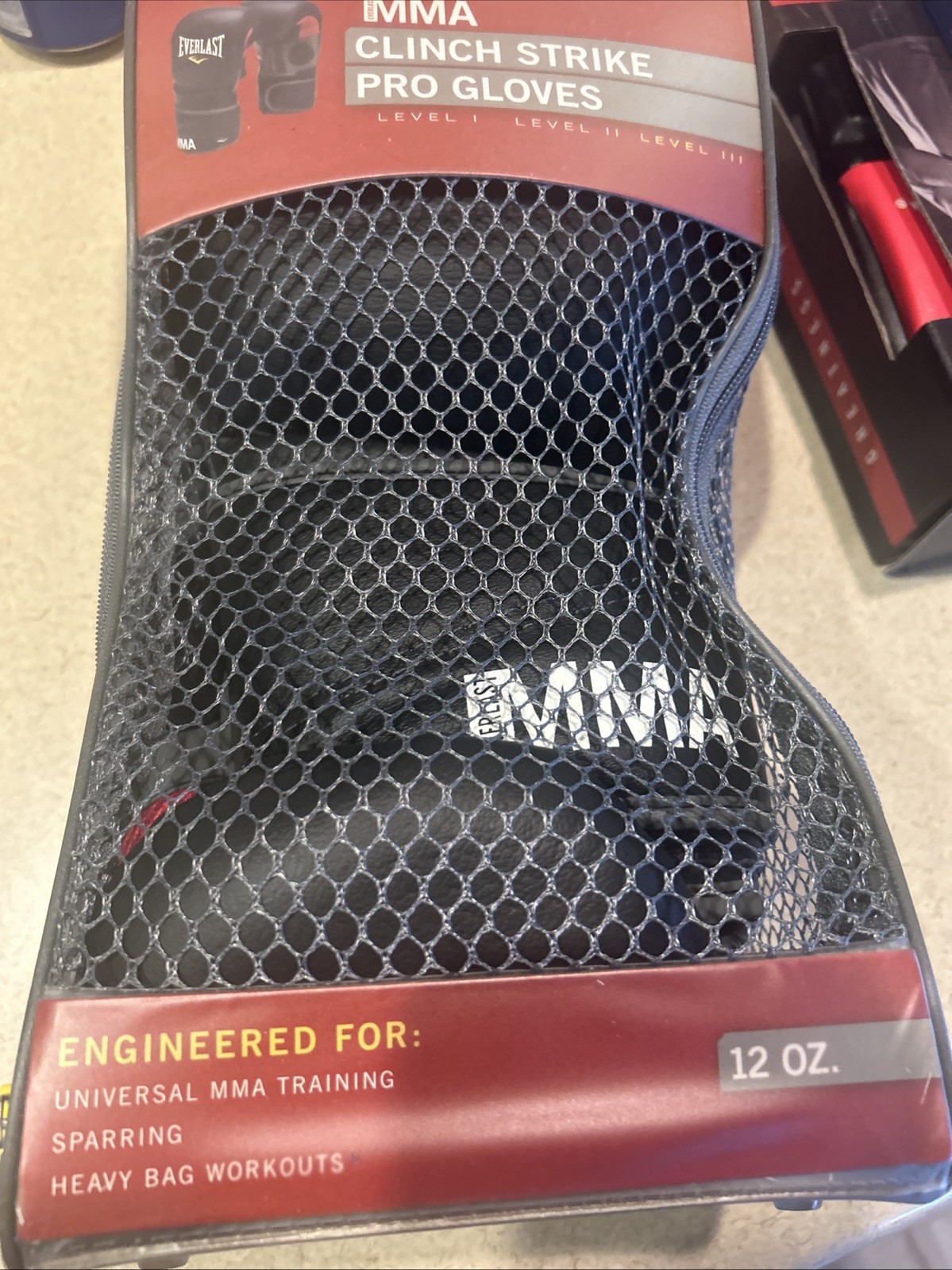 Everlast MMA Clinch Strike Pro Gloves Color Black Level  2 12 Oz.