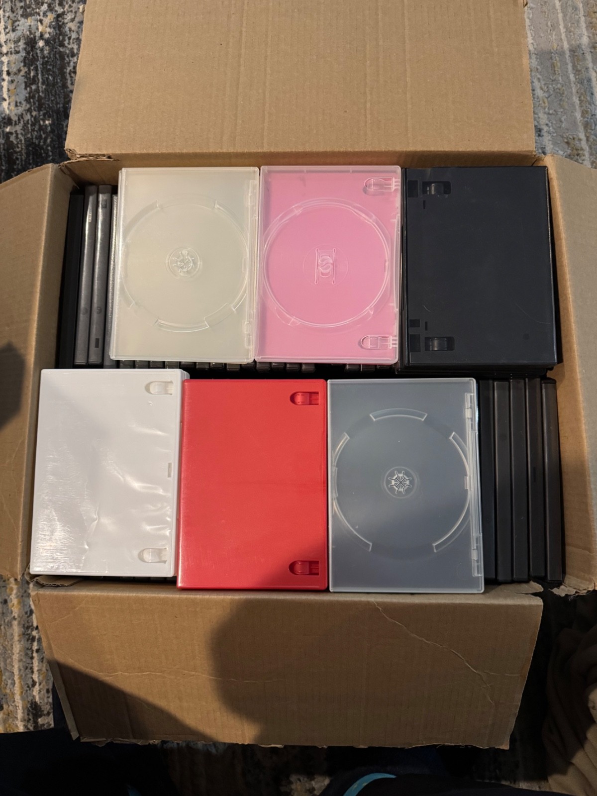 Bulk Lot of Empty DVD Cases - Multi-Color, Mainly Black, Some Multi-Disc Holders