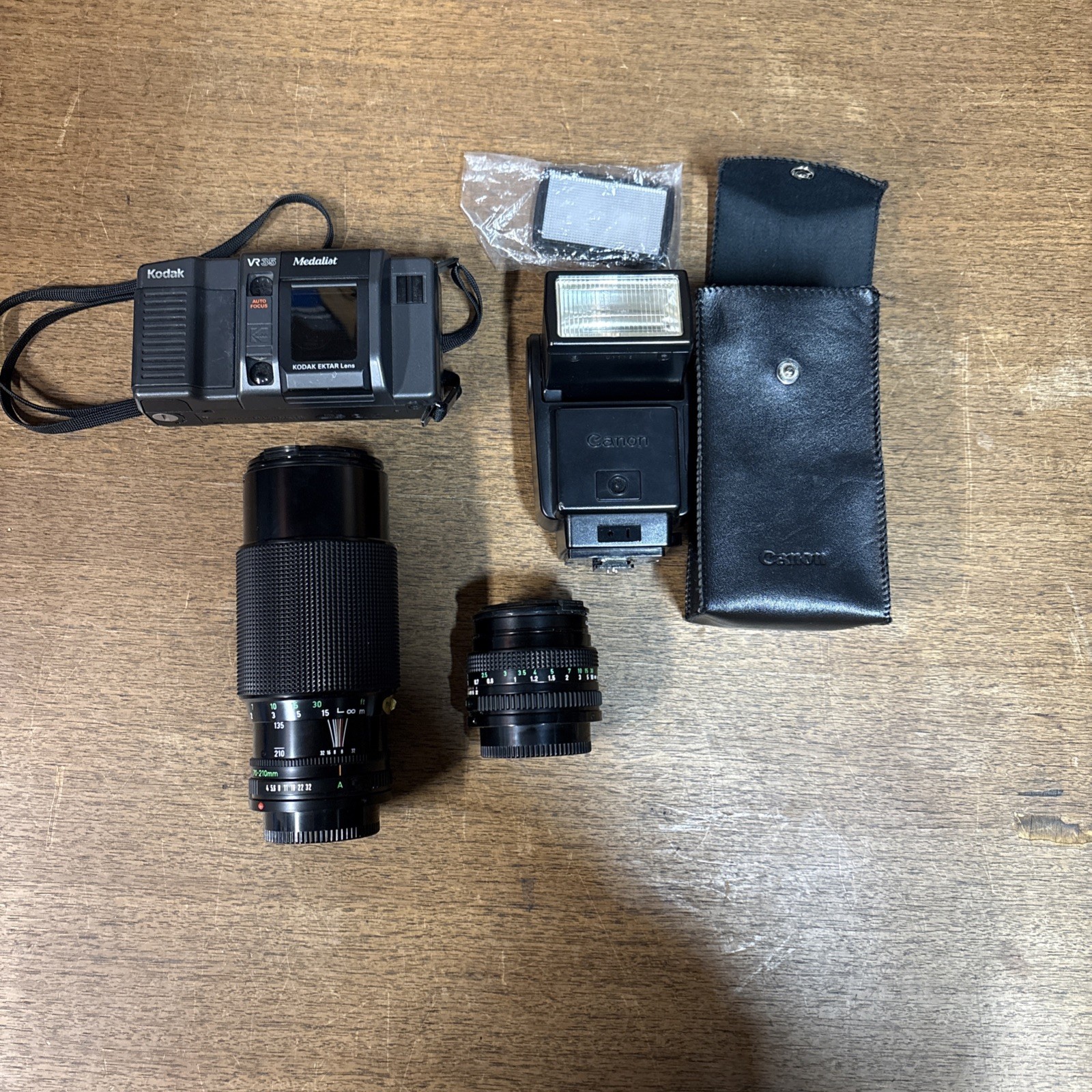 Lot Of Cannon Camera Equipment Lens, Flash And Kodak Vr35 Film Camera Untested