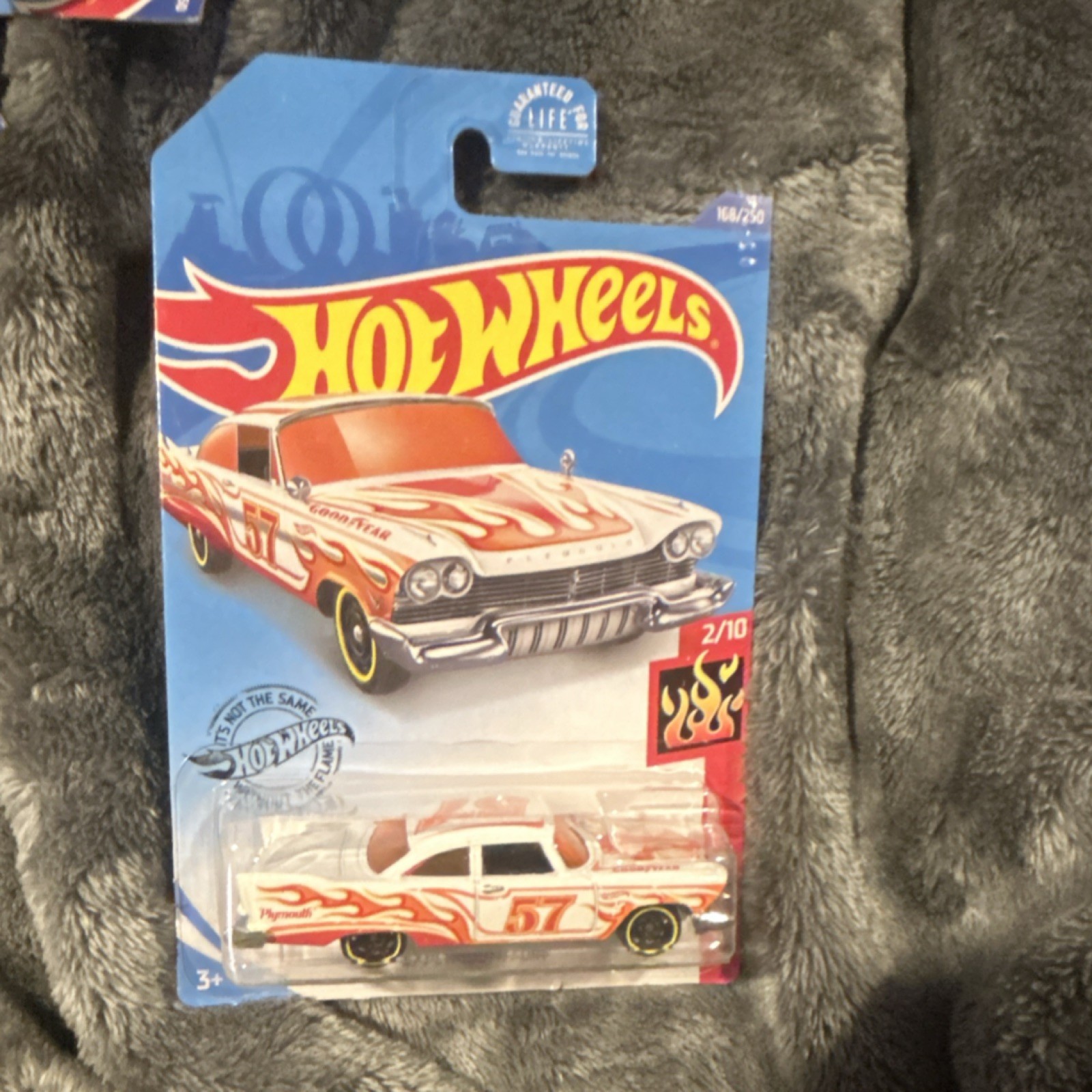 Hot Wheels 1:64 1957 Plymouth Fury HW Flames Diecast Car White Orange