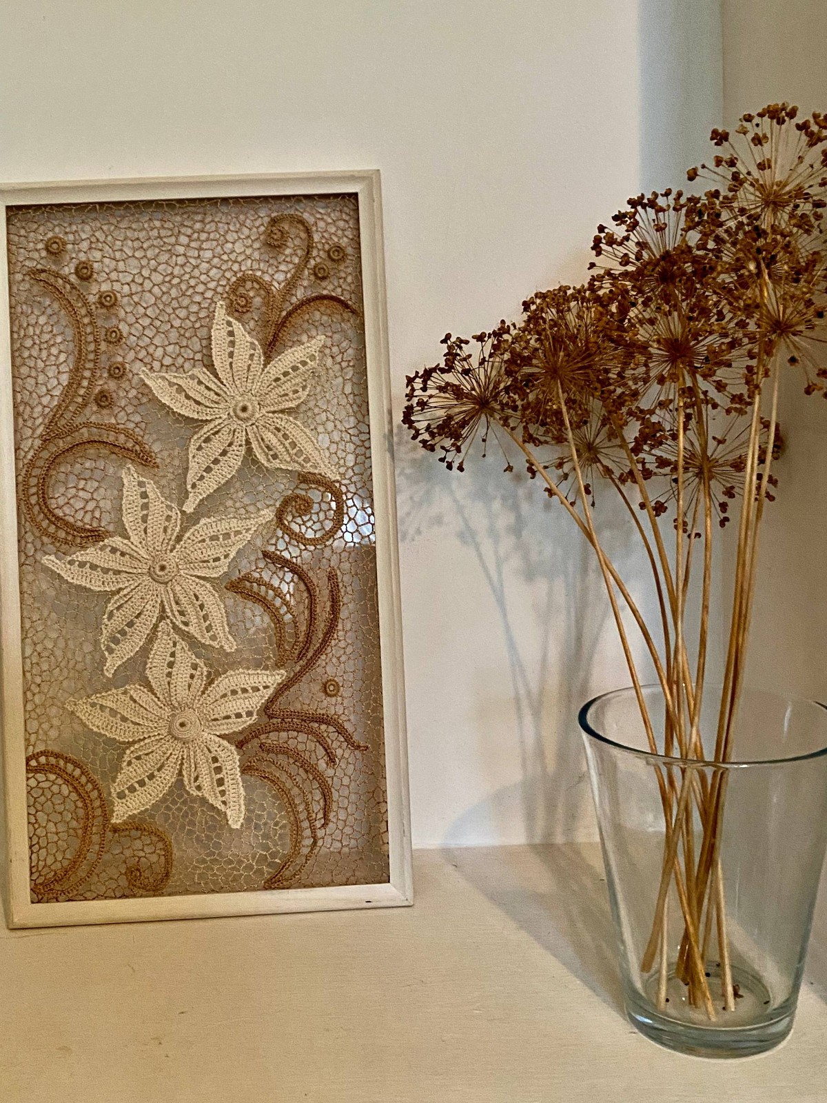 Traditional Irish lace presented as a sculptural framed composition