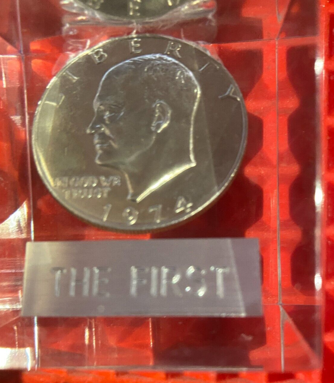 1974 Liberty Dollar Coin In Plastic Block