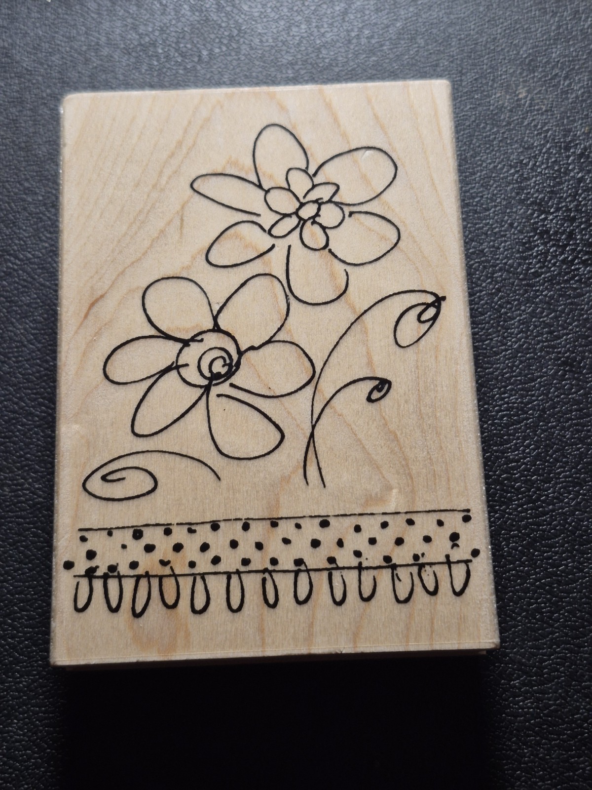 Wood-mounted rubber stamp from a "Doodle This - Flowers/Swirls"