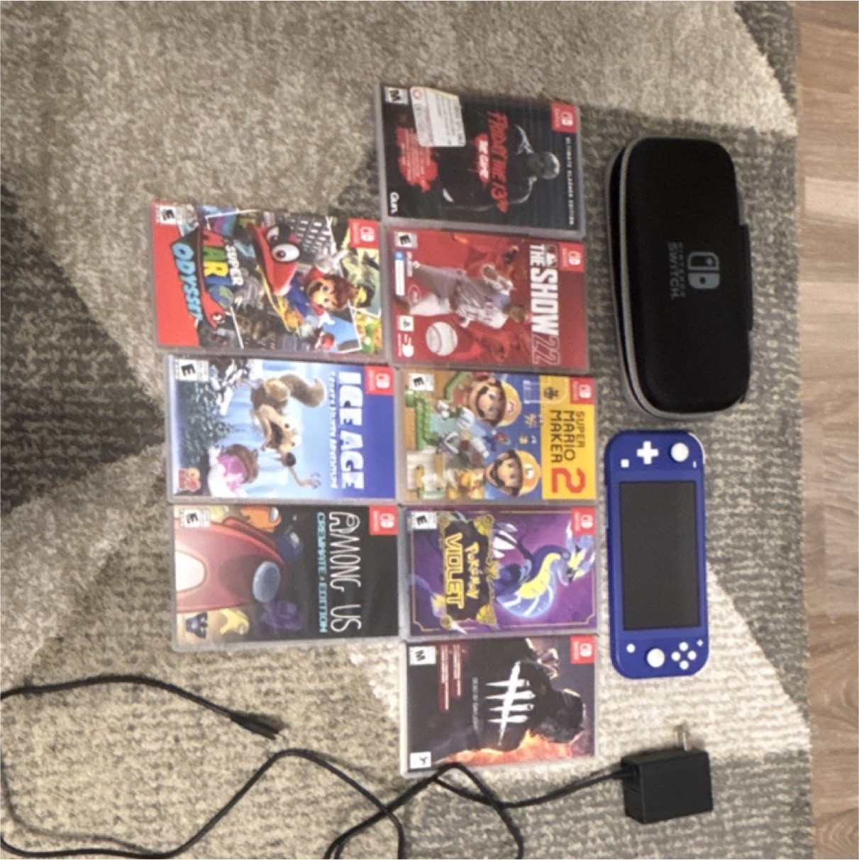 Nintendo Switch Lite Blue Console, Carrying Case, Charger, 9 Games, Super Mario