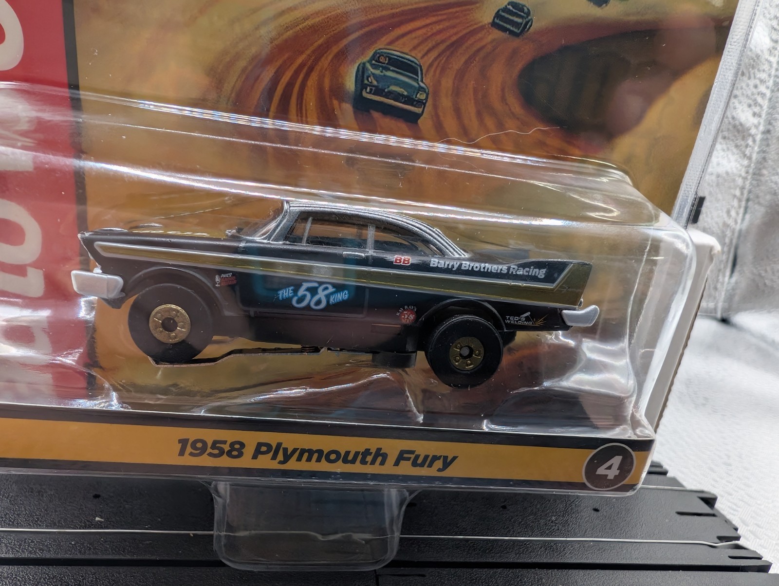 Auto World  1958 Plymouth Fury #58 (Flat Black & Gold) HO Slot Car Gold Wheels