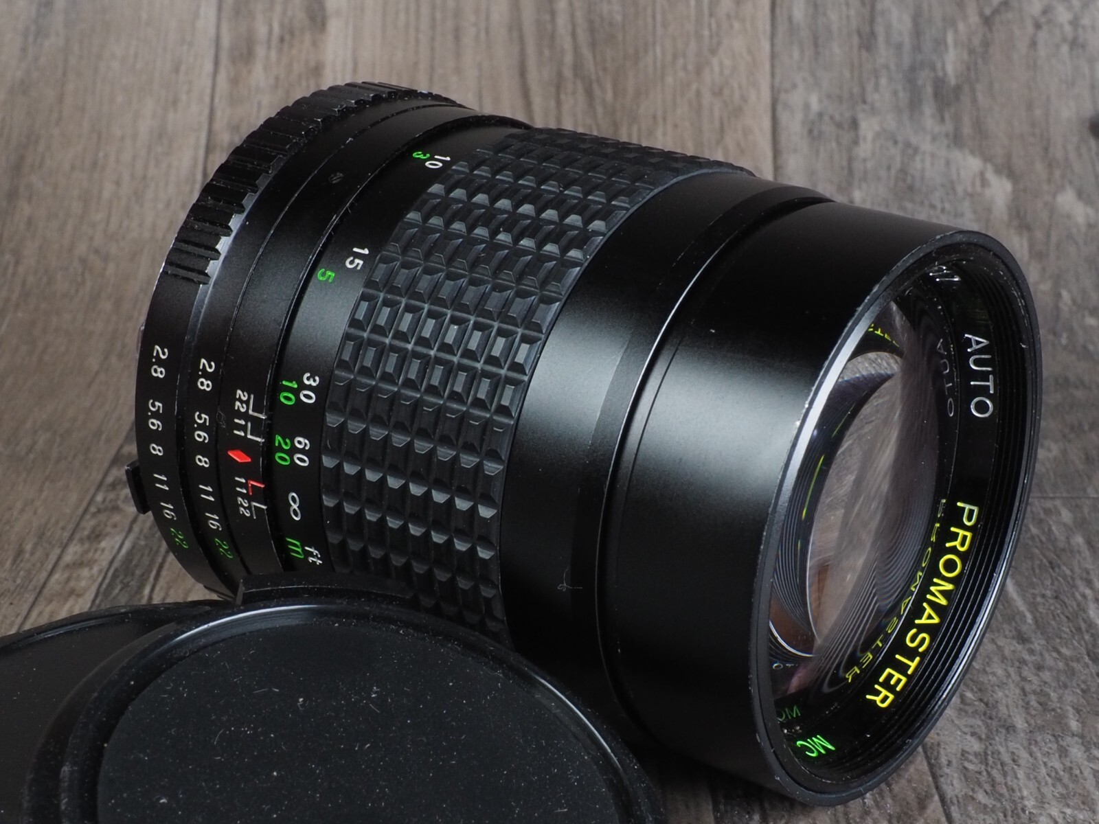 Promaster MC 135mm f2.8 manual Focus Minolta MD prime Telephoto portrait caps