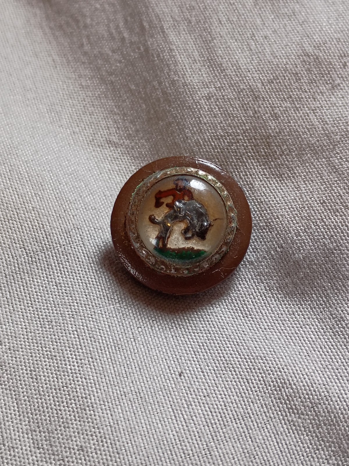 Antique Bucking Bronco Glass Top Composition Button.