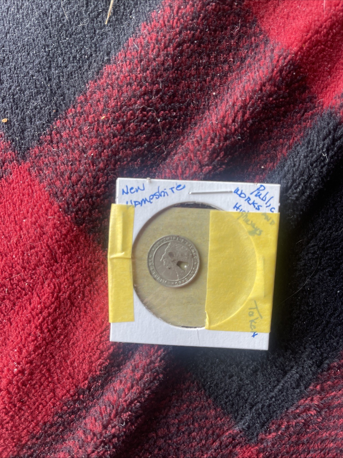 NH 770 B New Hampshire Public  Works and highways Token punched with a B