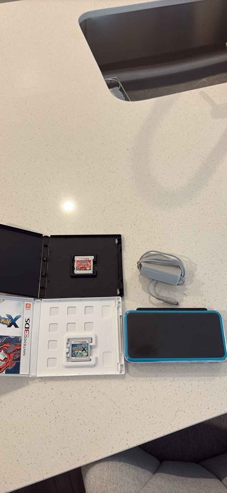 Nintendo 2DS XL Console with Charger, Stylus, Pokemon X & Omega Ruby Games