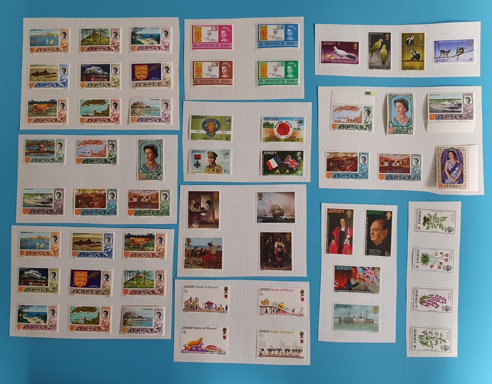 A Collection Of 60 Jersey mounted Mint Stamps #3956