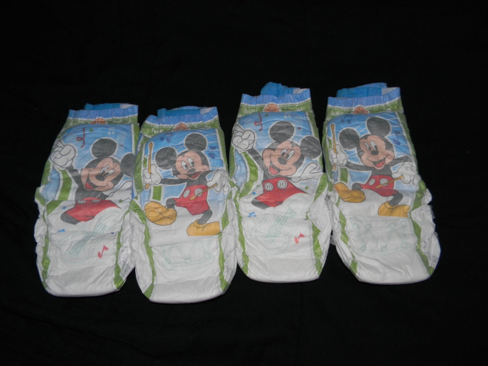 4 sample Huggies Pull-ups 6t-7t over 55-75 Lbs .