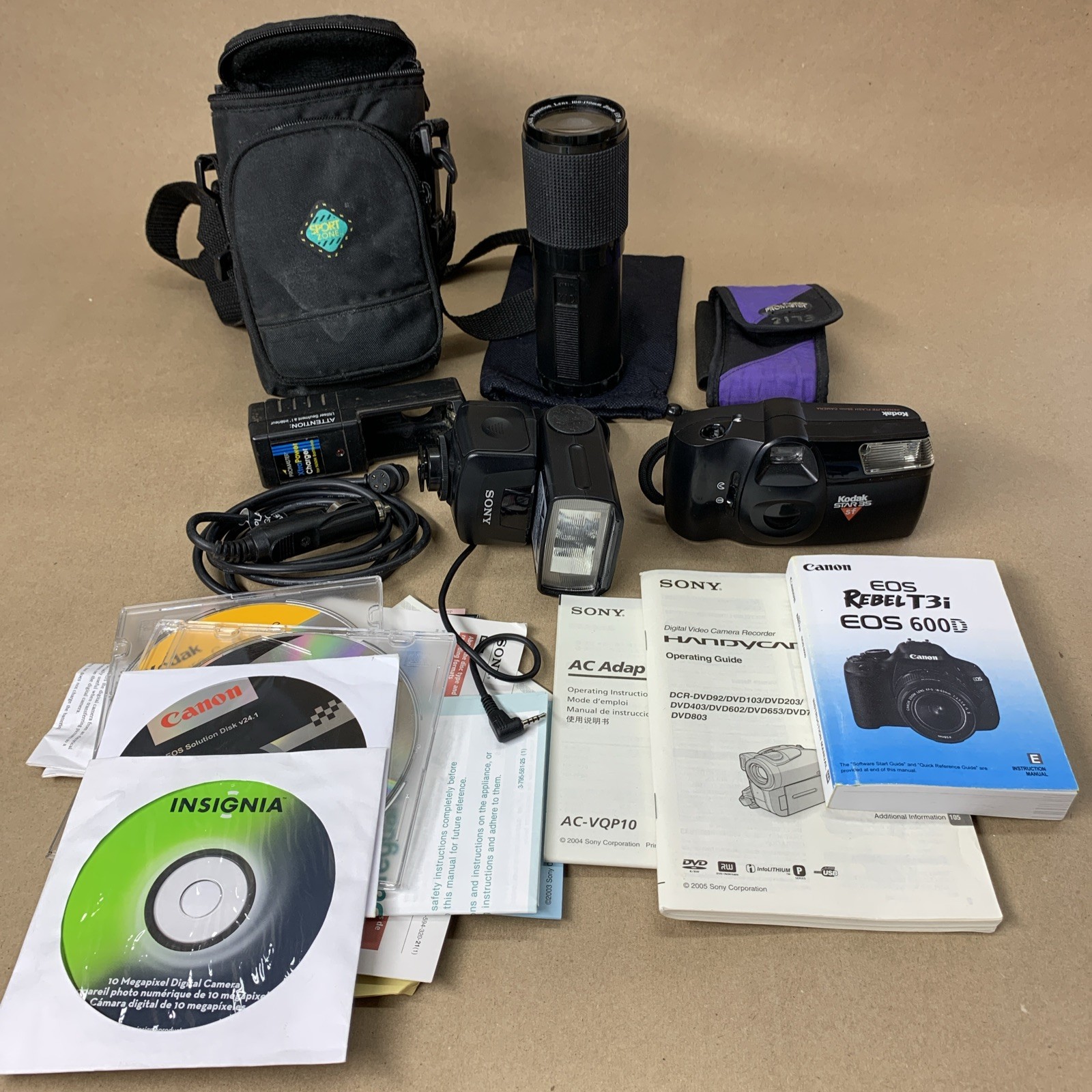 Lot of Camera Accessories, Sony Flash, Kodak Camera, Lens, Manuals, and Cases