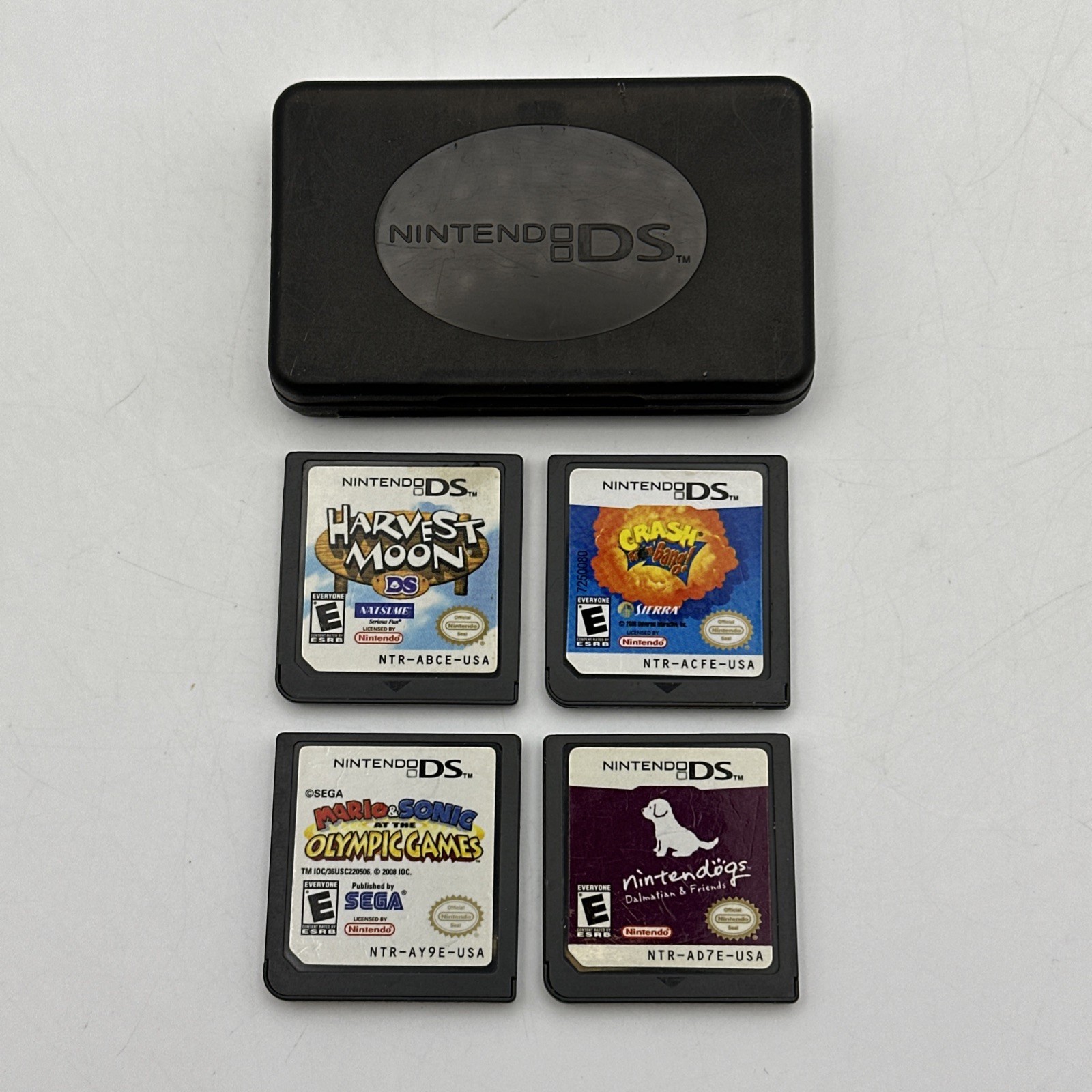 Nintendo DS 4 Game Lot Crash Boom Bang Harvest Moon Nintendogs Mario & Sonic