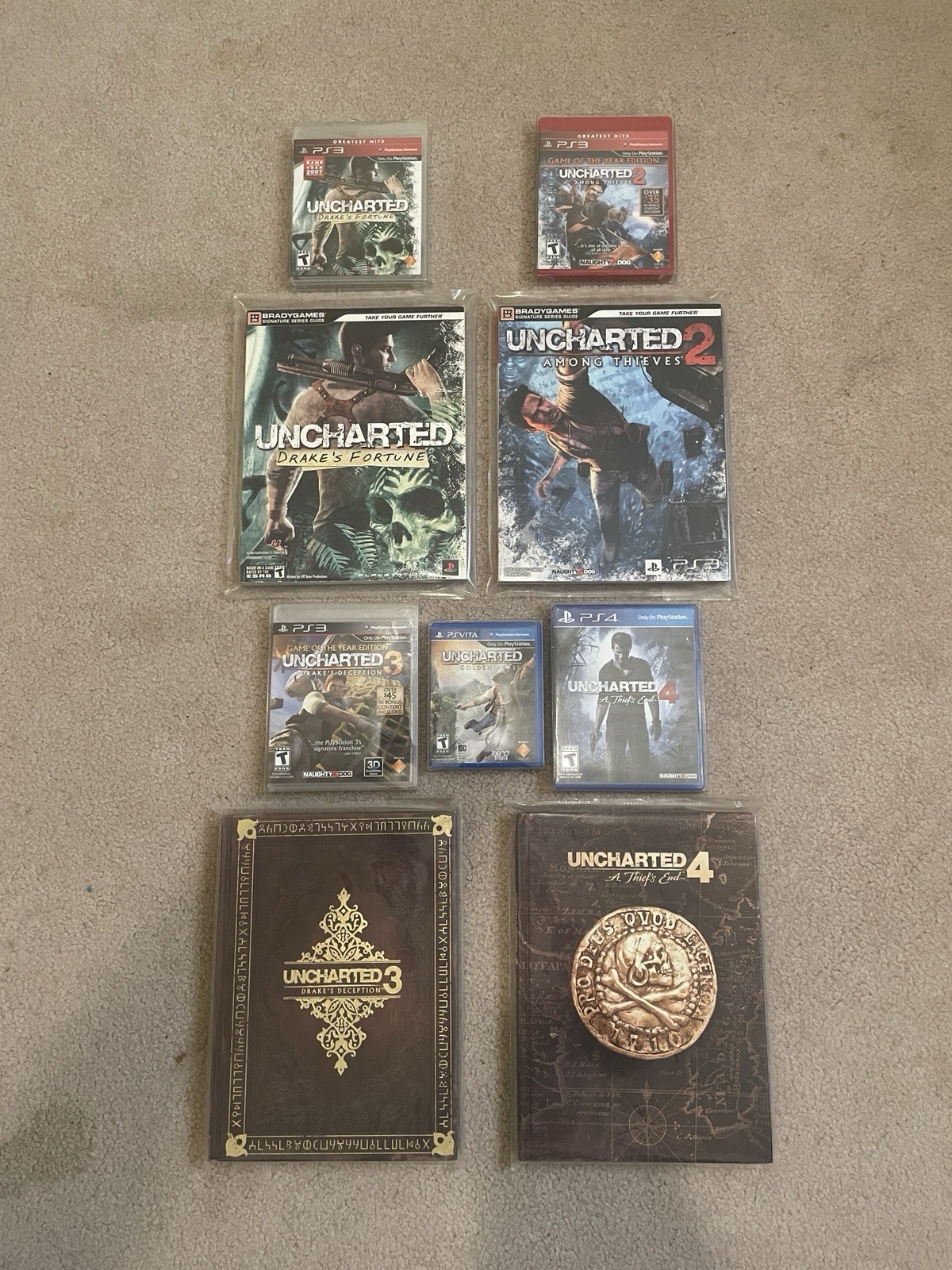 Uncharted Series-Uncharted 1-4 with Strategy Guides and Golden Abyss Lot