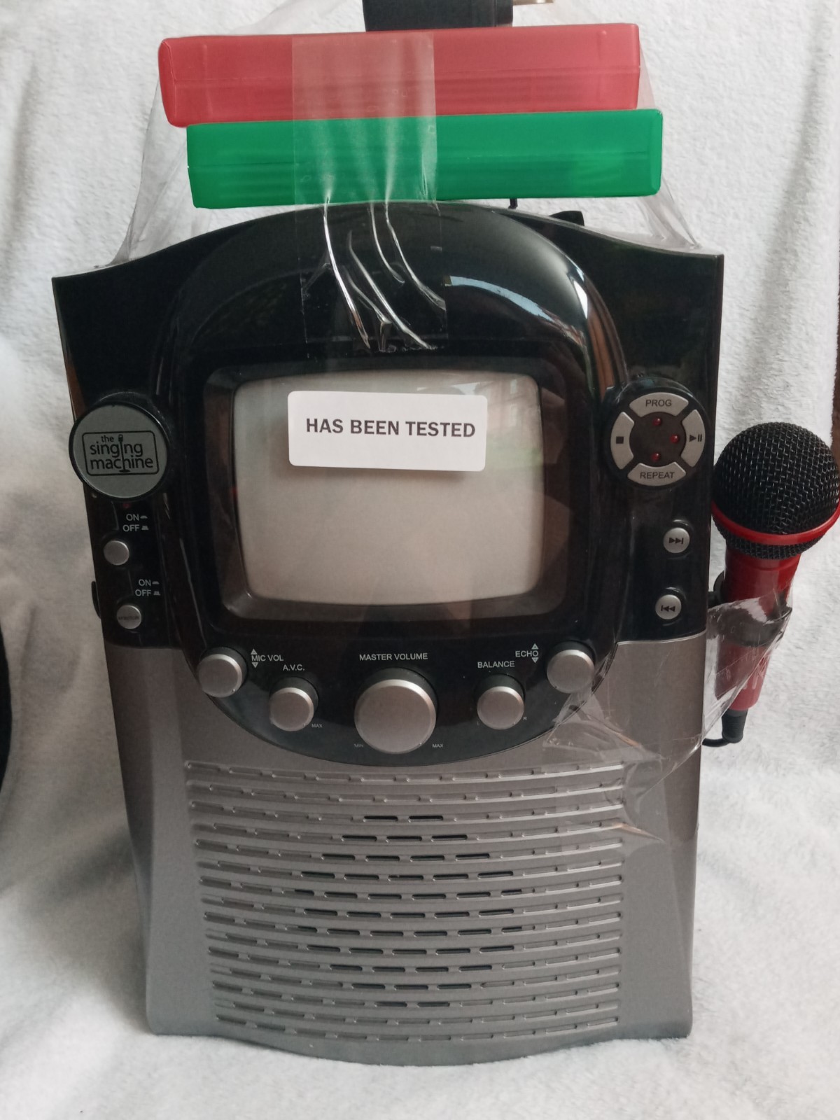 The Singing Machine Model STVG-559; w/Microphone, 2 CDs & Cords