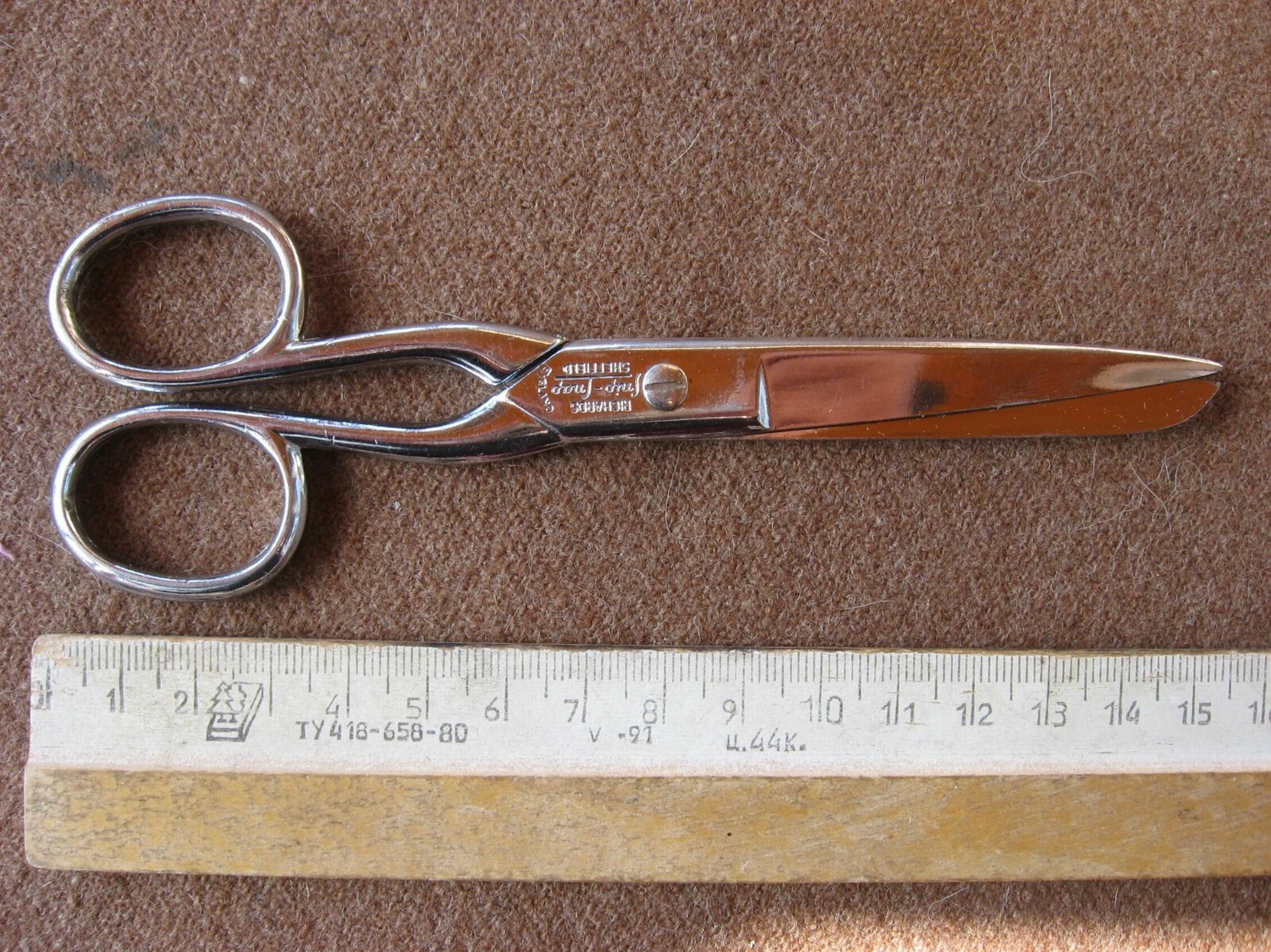  Chrome plated vintage scissors with a stamp. England