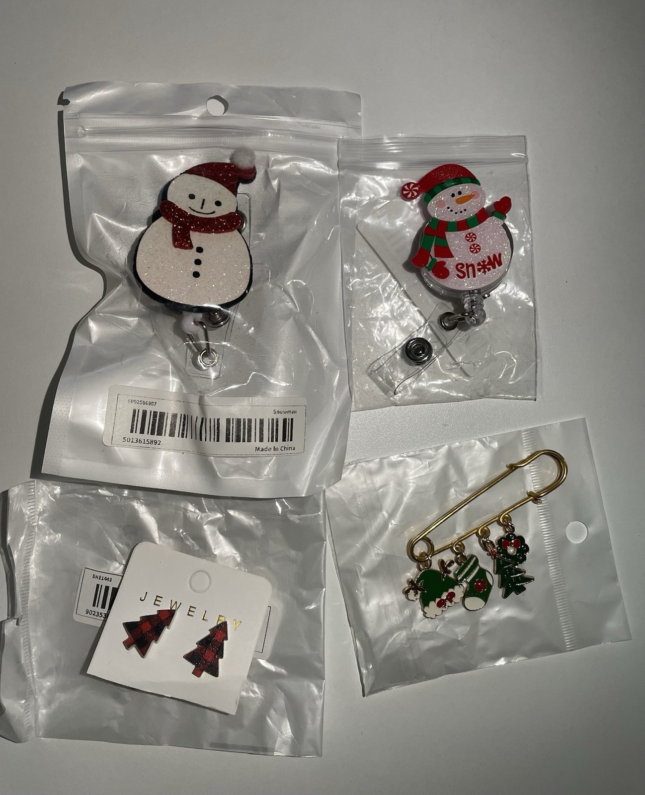 Snowman and Christmas nurse 2 set badge reels and 1 Christmas Brooch 1 earrings